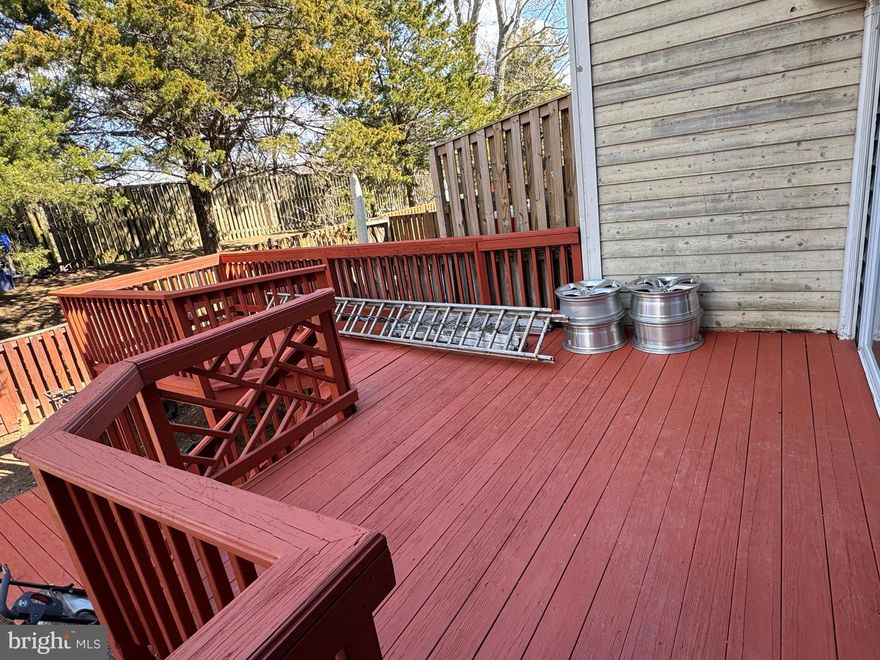 Come see this beautifully renovated townhome. Home features new laminate floor, remodeled kitchen with brand new granite counter tops. Townhouse is in a great location. Gas Fireplace in the family room with two sliding glass doors to open to a large deck with a private fenced in backyard. Finished basement with full bath room and a large rec room and den. Show Great and Owner is very motivated to sell.