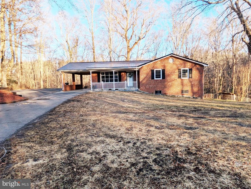 Here is the house for you! This home is in an established neighborhood with mature trees. The carport features a beautiful wood ceiling.  Located at the end of a cul de sac. Hardwood floors. Remodeled kitchen and bath.  Large deck.  All rooms are spacious! Full basement is finished. Strong brick exterior. Close to where you want to be. Make an appt today.
