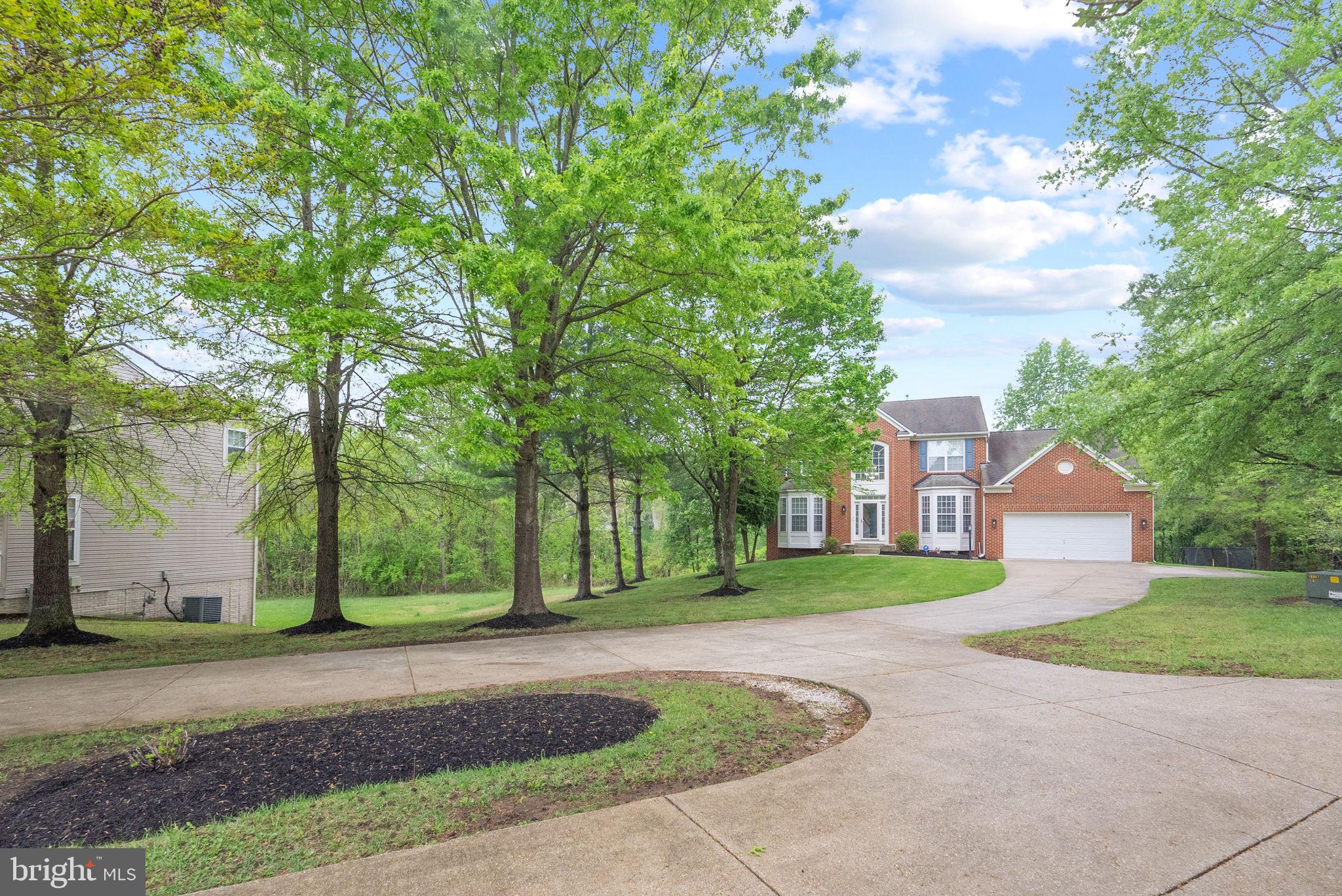 Elegance and sophistication define this luxurious residence nestled in the prestigious Fairwood community with a rare 150ft treelined Horseshoe driveway. The fully finished basement is also perfect to rent out and allows you to generate rental income while privately enjoying the upper two levels. With 5,000 sq ft spread across 3 levels, the open floor plan, wide staircase, and hardwood floors throughout create a majestic ambiance in the 2-story foyer. Revel in the comfort of a separate dining and formal living room, a large family room, eat-in kitchen, and a full bedroom with ensuite bathroom which can also be used as a main level office. The owners did not spare a dime with the top of the line renovated kitchen equipped with Quartz counter tops, the latest stainless steel appliances, and a large waterfall peninsula island and a bonus free standing island and built in stainless steel wine cooler. The main level also has an additional powder room, laundry room with a utility sink and a spacious two car garage with additional storage space. The main level is completed with a large "L" shaped wraparound deck with a walk down staircase made of high quality compost material. The upper level boasts 4 bedrooms and 2 full baths, the primary suite is a sanctuary with a sitting area, his and her closets, vanities, standing shower and separate soaking tub. The fully finished basement offers a large recreational area which is great for entertaining family and friends, and two large full sized bedrooms and large walk in closets. If you're in need of storage space, this is the perfect home for you with large closets throughout the home and basement. As you exit the basement, you are greeted by the spacious and tranquil tree lined backyard.
The fully finished basement is also perfect to rent out and allows you to generate rental income while living upstairs. Don't Wait, Schedule Your Private Tour Today!