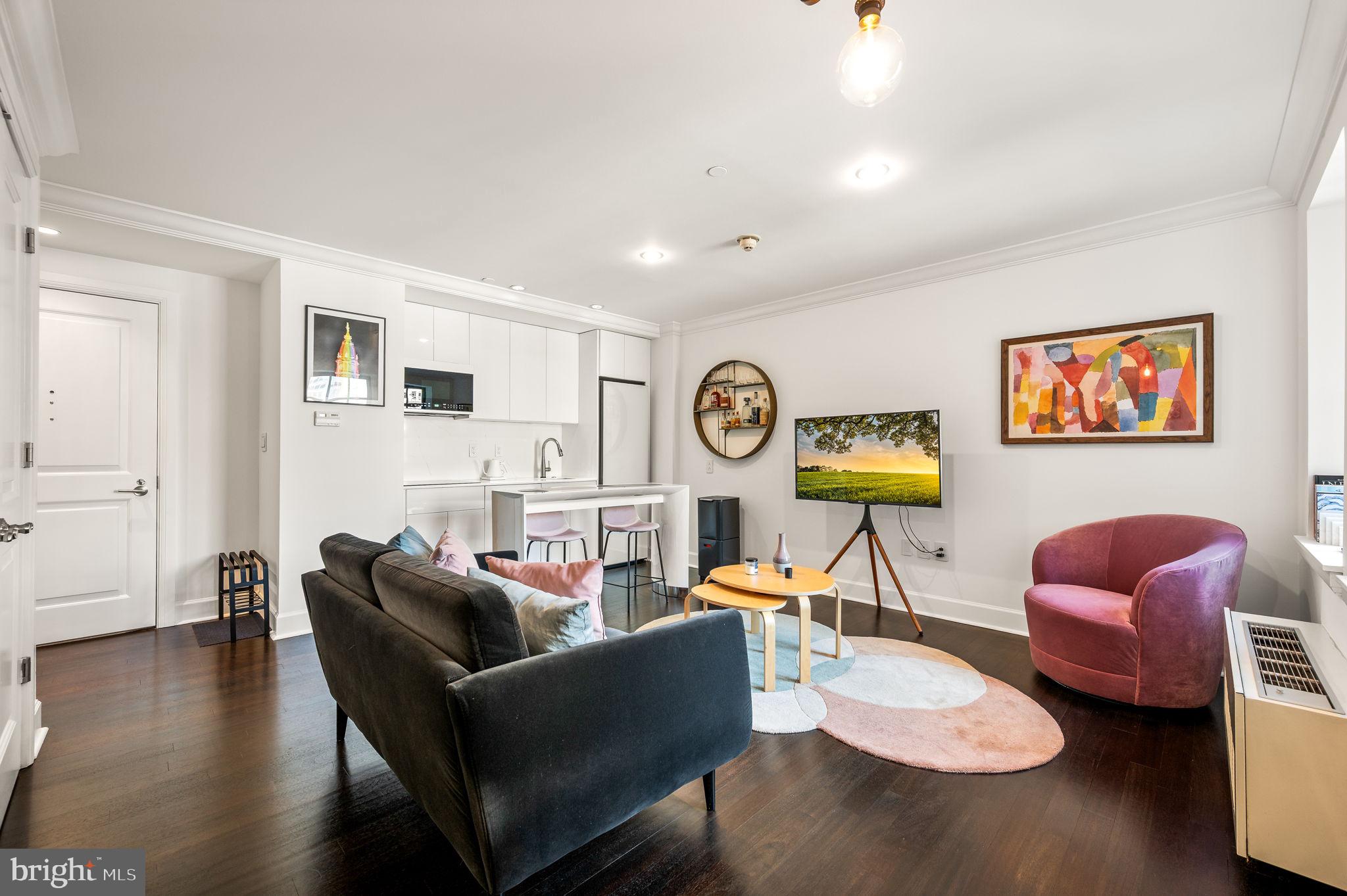 Experience effortless city living in this sleek and stylish one-bedroom residence at the iconic Warwick Condominiums, just steps from Rittenhouse Square. Thoughtfully renovated, this home features a modern European-inspired kitchen with custom cabinetry and seamlessly integrated appliances, creating a clean, minimalist aesthetic. Appliances include an Empava induction cooktop, Bosch dishwasher, Samsung refrigerator, and a microwave. Hardwood floors flow throughout, complemented by generous storage and a convenient combo washer/dryer. Residents enjoy all the benefits of hotel living with access to The Warwick Hotel’s amenities, including a 24-hour concierge, state-of-the-art fitness center, in-residence dining, housekeeping services (a la carte), and direct access to Bluestone Café, Spice Finch, and The Rittenhouse Grill. Condominium owners also enjoy the privacy of a dedicated elevator. Valet parking is available on-site for $395/month. Pet-friendly building . Live in Philadelphia’s premier location, with the city’s best dining, shopping, theaters, and transportation right at your doorstep.
