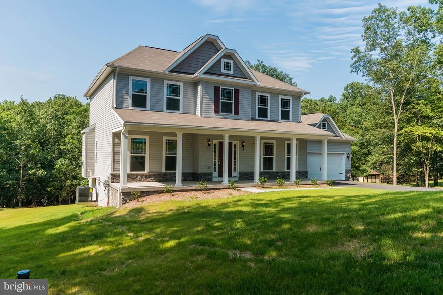 Turnkey New Home!   Over 2300 sq feet of living space in this new home!  4 bedrooms including the owners suite featuring private bath with dual vanity and tiled shower with built in seat and glass enclosure.  Lot is surrounded with trees with mountain views.    Covered front porch, kitchen with island with granite countertops, 2 floor laundry, great room with a fireplace, full unfinished walk out basement for storage or future living space.   Located in the Cacapon South subdivision right off rt 522 ,makes an easy commute to Winchester, Martinsburg, or Hagerstown!   Gemcraft Homes also has a model home close by, located at 1354 Fairview Drive in Berkeley Springs where you could also check out other floor plans the builder can do.   Model is open 7 days a week!   Berkeley Springs was voted one of the Top 20 small towns in the country!  Come see why.   Local shops downtown, Coolfont Resort, Cacapon State Park, enjoy fishing / kayaking on the Cacapon River.