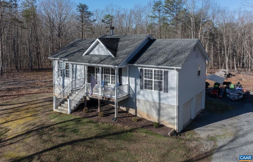 Welcome to this beautifully maintained 1,300 sq. ft. ranch home perfectly situated on a quiet cul-de-sac lot with an exceptionally private backyard. From the moment you arrive, the full front porch offers the perfect place to relax and enjoy the peaceful setting. Inside, you?ll find a bright and open floor plan featuring a vaulted family room with a cozy wood-burning fireplace, creating a warm and inviting gathering space. The vaulted eat-in kitchen features hardwood flooring and plenty of room for everyday dining and entertaining. This home offers 3 bedrooms and 2 full baths, along with almost new carpet and fresh paint throughout, making it truly turn-key and move-in ready. Step outside to enjoy the new rear deck, perfect for grilling, entertaining, or simply taking in the privacy of the backyard. Additional features include low-maintenance vinyl siding, a two-car attached garage, and an unfinished basement already roughed-in for a future full bath, offering excellent potential for additional living space. This is a rare opportunity to own a well-cared-for home with room to grow in a quiet, private setting.