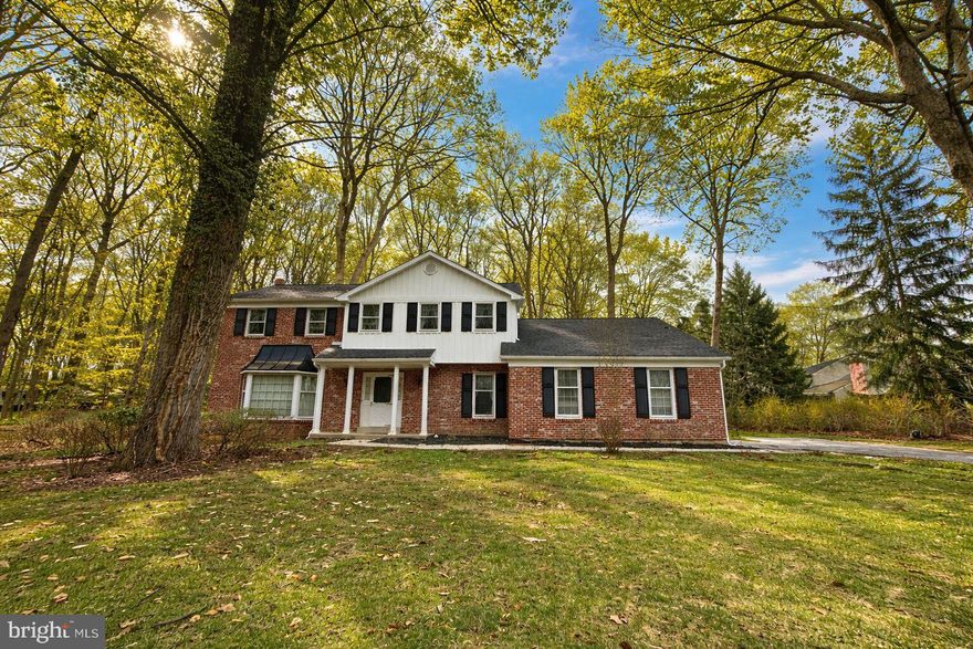 Coming soon to West Chester! This 4 bedroom 2.5 bathroom 2803 sq foot home is loaded with potential and just outside the amazing West Chester Borough!  Situated on a wooded 1.1 acre flat lot, it offers a lot of privacy.  As you pull up, you will notice the beautiful brick on the front of the home and a covered front entryway.  Enter the front door and you are greeted with a foyer and coat closet.  To the left is a large living room with bay window.  The dining room has a chandelier and a nice view of the backyard.   The eat-in kitchen has plenty of cabinetry and countertop space. It also has a double oven, electric cooktop, hood vent, a double sink, a small island, and a pantry closet.   Just off the kitchen is the family room with wood paneled walls, a brick wood burning fireplace, lighting sconces, and a slider door that leads to a rear brick patio with a wooded/tree view and a shed for gardening tools.  There is also a first floor office, laundry room with laundry sink, powder room, and access to a large 2 car garage.   Make your way upstairs and you will find 4 nice sized bedrooms and two full bathrooms.   One of which is the primary bedroom suite which has two walk-in closets, a dressing area, and a large bathroom.  There is also another full bathroom and an attic with pull-down stairs in the hallway.   The large basement is just waiting to be finished.   It offers great storage and has a workbench area.  The home also has a Kohler whole house generator to keep important items running during storms, public water/sewer, and a quality Lennox HVAC system (2017) with natural gas heating.   Located in a fantastic neighborhood that is just a short 5 minute drive into the West Chester Borough which offers many great restaurants and nightlife.  It is also close to East Bradford Park, shopping centers, and the Chester County Hospital.  The home does need updating, but the bones of the home and layout are great.   Schedule to see this one asap, it should go fast!