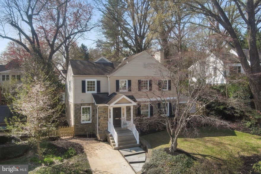 Welcome to this beautifully renovated 3-bedroom, 3.5-bath residence in the coveted Westgate neighborhood of Bethesda. Offering a thoughtfully reimagined living space, this home blends timeless architecture with sophisticated modern upgrades.
On the main level, a large foyer opens to a formal living and dining room as well as a second living area that could also serve as office or be converted into a bedroom. This level has been enhanced with new wide-plank oak flooring, creating a fresh, cohesive aesthetic throughout the primary living spaces.
At the heart of the home is the stunning, fully renovated custom-made gourmet kitchen featuring sleek Italian cabinetry (Gentili Cucine) with smart corner cabinets for optimal use of space, upscale laminam porcelain countertops and backsplash, premium Miele appliances and an Elica induction cooktop. Designed for both everyday living and effortless entertaining, the kitchen flows seamlessly into a sun-filled breakfast area and family room in the impressive two-story addition overlooking the patio and beautifully tiered backyard with storage shed. A sunroom off the living room with refinished flooring and new roof offers the perfect space to relax and enjoy the changing seasons year-round. 
Upstairs, the spacious primary suite provides a peaceful retreat with a renovated private en-suite bath (Porcelanosa) with radiant floor heating and upscale custom-built closets from Dall’Agnese Nodo. This is complemented by two generous secondary bedrooms, ample closet space and an updated hall bath. The fully finished lower level offers exceptional versatility with a large recreation room, renovated full bath, laundry area with new washer and dryer, and storage — perfect for guests, a home office, gym, or media lounge. New Pella windows throughout the house (2024) as well as updated systems (water heater – 2022, AC – 2024) complete this thoughtfully upgraded home.
Located just blocks from the DC line and only a mile from the Friendship Heights Metro, this home offers an exceptional balance of neighborhood charm and urban convenience. Set within the highly sought-after Westgate community, an area known for its quiet, tree-lined streets, strong sense of community with traditions such as seasonal parades, block parties, and local events that bring residents together year-round.
Enjoy easy access to Spring Valley with local favorites, such as Millie’s, Pizza Paradiso and Wagshal’s, the Capital Crescent Trail, nearby parks, the Little Falls Swimming Club, and the new Westbard Square with its growing collection of shops and dining.  
Commuting is effortless, whether by Metro, car, or bike, with quick connections to downtown Bethesda, Washington, DC, and major institutions like NIH and Walter Reed, as well as key commuter routes. The house is in-bound for Westbrook Elementary School, which is just steps away, Westland Middle School and B-CC High School.
Altogether, this location offers a rare combination of accessibility, livability, and community warmth.
The house has been freshly painted inside and outside and is ready for its new owner! A rare opportunity to own a turnkey, designer-updated home in one of Bethesda’s most desirable neighborhoods.