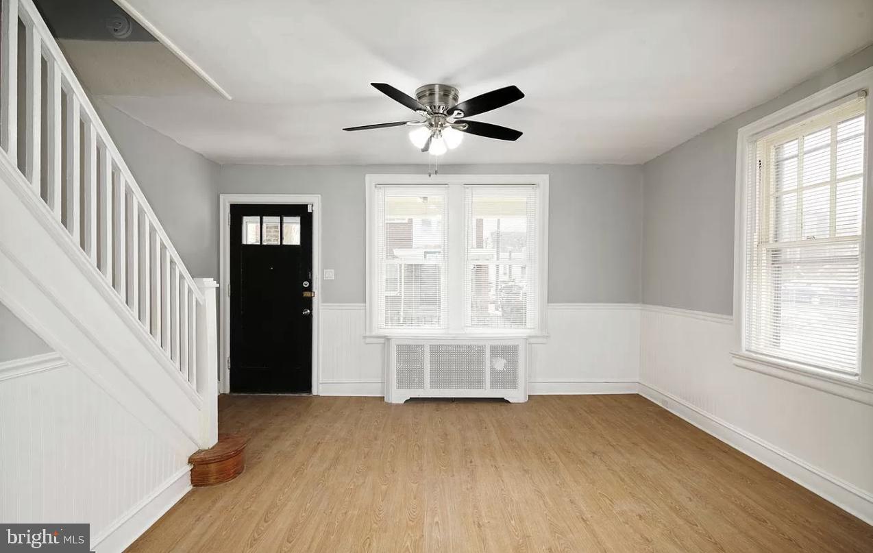 This Spacious Updated Home is ready for you to unpack and enjoy! The Open Living Room flows into a great sized Dining Room. The updated Kitchen has access to your own private yard. The Home Offers new Appliances and updated lighting. The second Level has three large Bedrooms with pristine hardwood floors. The Master bedroom offers a Large Walk In Closet. The updated Bathroom features modern tile finishes and gives beautiful natural light. There is ample closet and storage space and if that wasn’t enough the Basement offers another finished Room/Flex space with a Full Bathroom. This Home is amazing for entertaining. Don’t miss out making this charming home yours.
