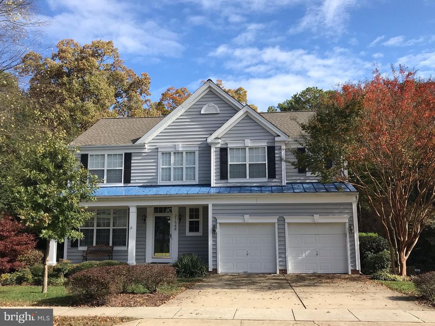 Beautiful home close to Gate 3. Hardwood floors thru out main level, 9' ceilings,neutral paint colors, quartz counter tops.Newer appliances.Remodeled master bath w/custom tile shower & tub surround. Roof in 2016. Sep laundry room upstairs. Walk out basement has rec room, wet bar & craft area. Shed,deck & nicely landscaped yard to include a Wye Oak tree! Walk /bike to neighborhood beach access.