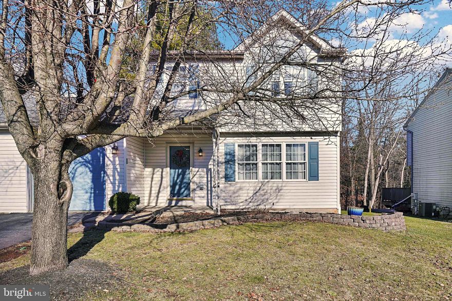 Beautiful semi-detached home in Exeter School District in the highly desired Long Pond Subdivision. You will fall in love with this well-maintained home with neutral decor throughout, a comfortable living room with an updated gas fireplace, and a large kitchen with stainless steel appliances, gas cooking, tiled backsplash, and breakfast bar. This open concept flows nicely to the roomy dining room, which has sliding glass doors leading to a 16' x 12' rear deck that overlooks a big backyard and wooded backdrop. A convenient main floor laundry room and powder room complete this main level. Upstairs, all 3 bedrooms are nicely-sized with plenty of closet space and share a large full hallway bath.  Downstairs, the basement has high ceilings, lots of storage, and outside egress. And did I mention the covered front porch, the one-car attached garage, the central air, or the economical gas heat? A one-year home warranty is also included! Call today to schedule your private showing!