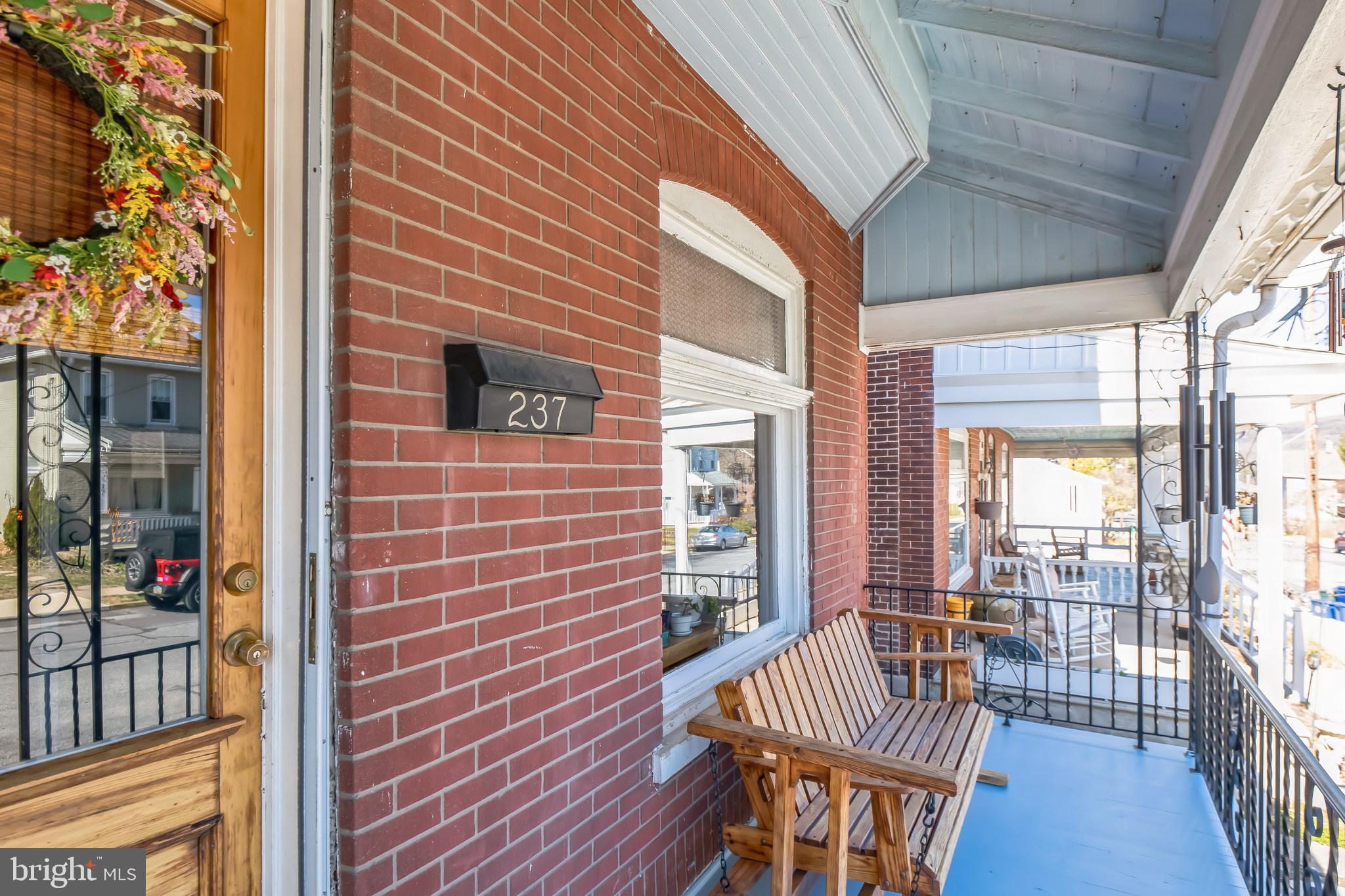 This delightful brick twin is full of character and waiting for it's new owners! As you step through the front door, you are greeted by a spacious and inviting living room perfect for relaxing and entertaining. The heart of the home is the cutest kitchen and nook that then takes you to your back deck and yard that's perfect for outdoor gatherings or morning coffee. Upstairs you'll find three generously sized bedrooms featuring hard wood floors. The bathroom provides more classic charm. If you need even more space the attic offers the potential for an office, storage, or playroom. The basement offers a woodshop, perfect for the hobbyist or DIY'ers. You'll stay cool in the summers thanks to the current owners, who had a a brand new HVAC system installed in 2021. The home has been freshly painted leaving you with a move-in-ready home. With it's blend of charm, versatility and functionality the home is a must see!
