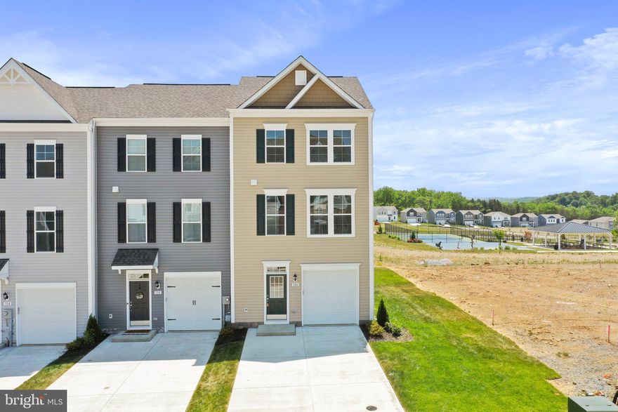 DRB Homes Overlook at Riverside - For GPS - Brand New Town Home 4 Bed Rooms, 2.5 Bath, Upon entry of this wonderful townhome, a finished rec room (can use as a 4th Bed Room). The main level offers luxury vinyl plank flooring throughout and a spacious living room with a powder room. The eat-in kitchen features an island, Quartz countertops and stainless steel appliances. The spacious primary suite features a generous walk-in closet and an en suite bath with a dual sink vanity and an oversized seated shower. Two secondary bedrooms & full bath, a linen closet and a centrally located laundry complete the upper level! Set in a wonderful new community, Dog Park, Children's park, Basket Ball Court, Tennis Court, and Recreation sit up area are free amenities. In a prime location for I-81, Rt 11, I-70 commuters, mountain views, walking distance to shopping, and restaurants, access to Spring Mills schools, and close to interstate just minutes from the MD line. This rental may not last long.