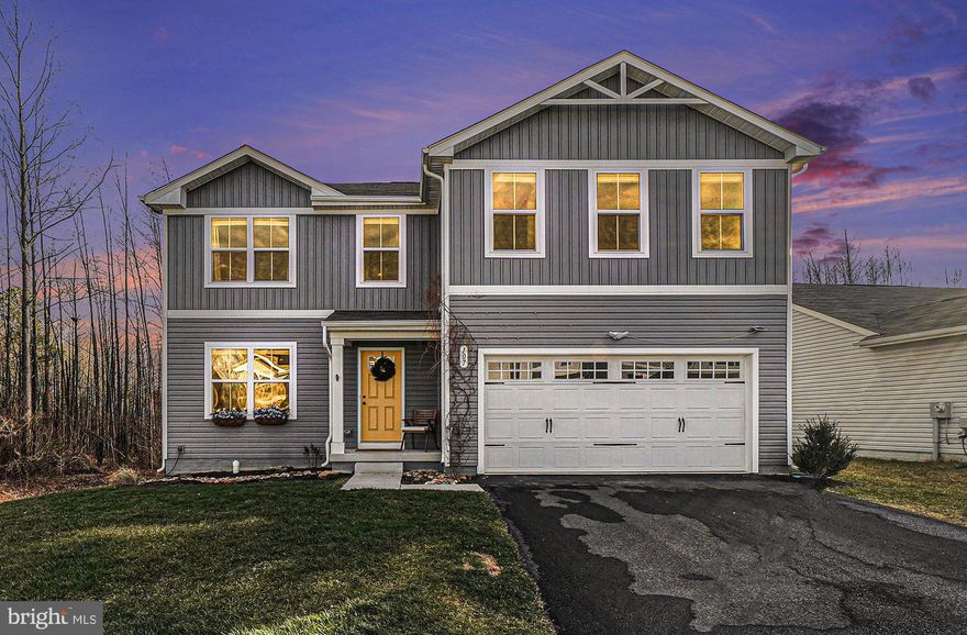 Welcome to this beautifully maintained 4-bedroom, 2.5-bath home built in 2022, offering a bright open layout and stylish finishes. The kitchen features white cabinetry, a large island, and stainless steel appliances, flowing seamlessly to the deck for easy entertaining. Upstairs you’ll find a spacious primary suite with a private bath and double sinks, three additional bedrooms, a versatile loft, and an upper-level laundry for added convenience. Enjoy peaceful views of trees from the backyard, all within a community that offers a refreshing swimming pool.