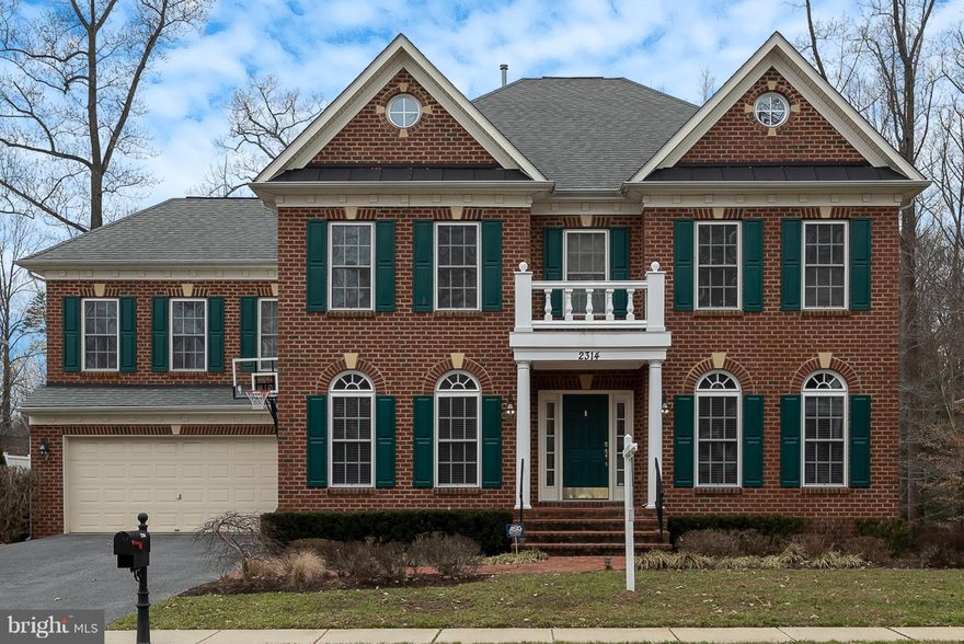 The fine living you deserve is found here nestled in a small enclave of upscale homes.  Throughout this 4 bedroom Annapolis home you'll find upgrades - tall ceilings, moldings,  and wrought iron railings, and  hardwood floors.  Bright, open floor plan with large windows that fill your home with sunshine and cheer.  Stepping into the foyer you will find your formal living room and dining room.  Your gourmet kitchen is an excellent design with plentiful countertop and cabinet space, double ovens, center island and gas cooktop.  Work from home in your main floor library/office with built-in shelving.  The family room and spacious sunroom share a 2 sided gas fireplace that's perfect for those chilly nights.   The vast ensuite master bedroom offers you a huge walk in closet, a mirrored dressing area and a private balcony. The lower level offers a home theater, a wet bar - a billiard room, large storage room and full bath.  Side entrance walkout from basement.  A private back yard is the perfect setting for grilling, entertaining and relaxation during the warmer months.    Minutes to downtown Annapolis, the medical center, restaurants and shopping.  Quick and easy access to  Rts, 50 and 97  for commutes to DC, Baltimore and Fort Meade.    Subject to 3rd party approval.