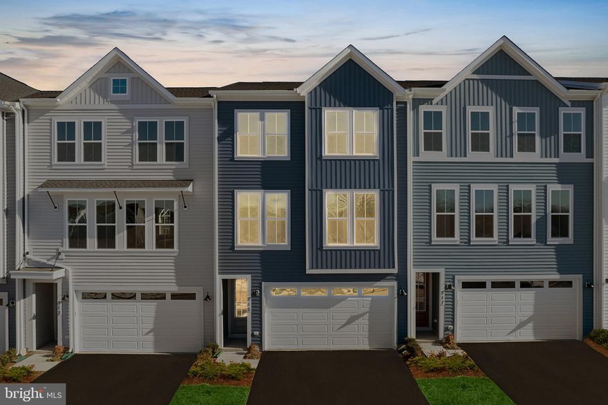 Step into modern elegance with this beautifully designed 3-bedroom, 2 full bath, 2 half bath townhome offering 2,434 sq. ft. of thoughtfully crafted living space in the desirable Snowden Bridge community in Stephenson, VA.

From the moment you enter, you’ll notice the 9’ ceilings on all three levels, rich oak stairs, and upscale finishes that make this home feel truly special. The heart of the home is the gourmet kitchen, complete with soft-close cabinetry, quartz countertops, an oversized island with built-in trash, spice pullouts, and a walk-in pantry with custom wooden shelving. The premium Samsung appliance package includes a refrigerator, microwave, dishwasher, and a gas range—perfect for the home chef.

Enjoy low-maintenance luxury vinyl plank flooring throughout the main living level, combining style and durability. The serene primary suite offers a spa-like escape with a frameless glass shower featuring tile flooring and shower walls with a built-in bench and dual vanities.

Ideal for both entertaining and relaxing, you’ll love the outdoor spaces: a 10’ x 20’ composite deck and a matching concrete patio below. Smart thermostats and zoned HVAC on the top two levels keep things comfortable and energy efficient year-round. A spacious 2-car front-load garage adds convenience and storage.

Living in Snowden Bridge means more than just a beautiful home—it’s a lifestyle. Enjoy resort-style amenities including a swimming pool with splash park, indoor sports plex, tennis and basketball courts, scenic walking and biking trails, a dog park, playgrounds, and a vibrant clubhouse for social gatherings.

Whether you're looking for a place to grow or simply a home that checks all the boxes, this move-in ready townhome has it all. Schedule your private tour today and come see why Snowden Bridge is one of the area's most sought-after communities!