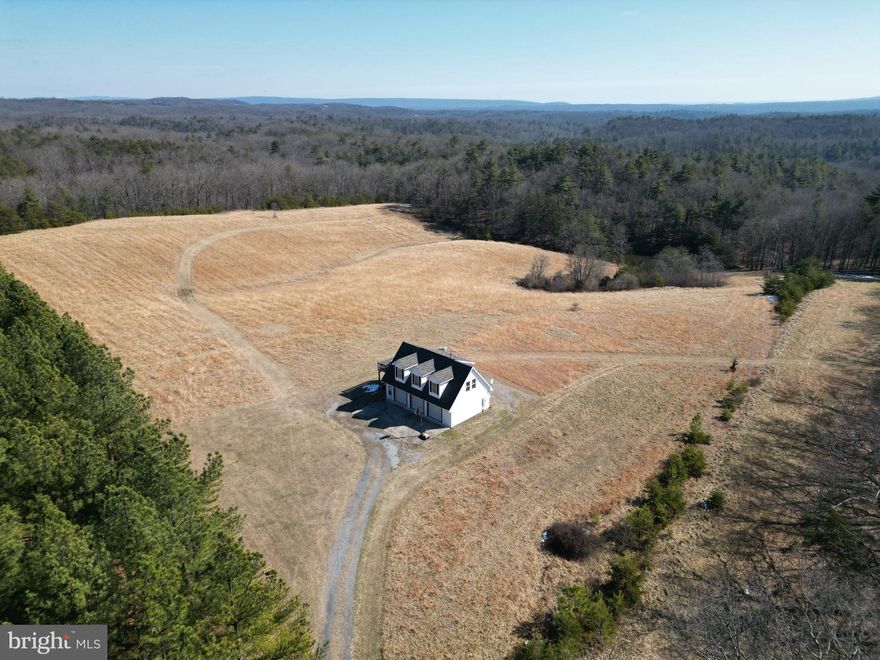 Own a piece of beautiful Bloomingdale Farms which hasn’t been on the market since 1995. This land has been family owned and operated for decades. Located just minutes northwest of Winchester near Lake Holiday. Featuring a 24 ft x 40 ft three car garage with living quarters upstairs. The living quarters feature a full bathroom, kitchenette, and a large open space. Access is secured by a 50 ft wide deeded access easement off US-522 North Frederick Pike. The entrance is gated and most of the easement has already been installed and graveled. A small stream marks the southern boundary of this parcel adding to its beauty and character. There are potential building sites located throughout the property. This tract is currently being used for recreation but it would also make an excellent site for your dream home or vacation rental. A 1 bedroom septic system is installed but the land is actually approved for a 4 bedroom septic system. A drilled well and electricity are also installed on this parcel. Decent views of the surrounding countryside are attainable with some tree clearing. This property features mildly sloping topography which is builder friendly and allows for enjoyment of the land. Currently enrolled in the county’s land use program to reduce the annual taxes. Mix of open and wooded acreage that is zoned Rural Areas (RA). Enjoy hiking, camping, and recreation of all types on this land. Experience exciting hunting as many types of wildlife call this property home including deer, turkey, and many small game species. An almost new and very modern elementary and middle school are located just minutes away. A short drive from all the amenities and attractions Winchester has to offer. 

 ***Additional adjoining acreage available for purchase. See aerials for details.***