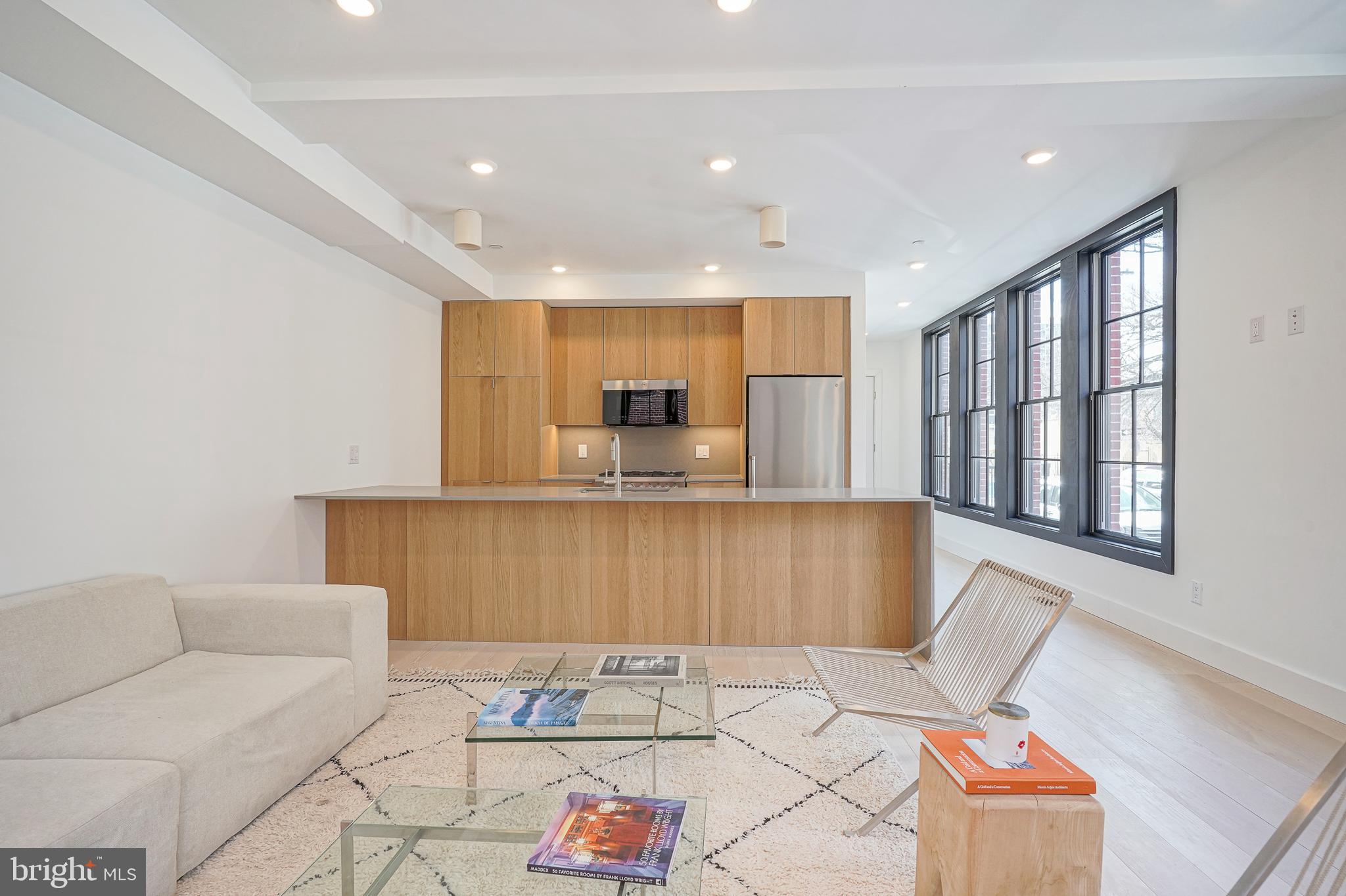 Seller will provide a 1 year pre paid parking spot at a nearby lot with an acceptable offer. Introducing the newest addition to the Historic Spring Garden neighborhood of Philadelphia, The Mason, a boutique new development featuring 10 bespoke condominiums that boast modern living at its finest. Each of the 10 units include 2 bedrooms, 2 bathrooms, an open floor plan layout with pristine hardwood flooring throughout, a Bertazzoni stainless steel appliance package, and striking bathrooms with glass wet rooms. The vast historic-style windows in every unit allows tons of natural light to flood the space, creating a warm and inviting atmosphere. One of the highlights of this building is the private green rooftop deck available for the penthouse units, providing unobstructed center city views that will leave you in awe. The Mason comes with a FULL 10 Year Tax Abatement and 1 Year Builder's Warranty. Located in the vibrant and historic Spring Garden neighborhood of Philadelphia, residents will enjoy a wealth of amenities and attractions just steps from their front door. From trendy restaurants and bars to world-class museums and parks, there is always something to do in this exciting neighborhood. Don't miss your chance to own one of these stunning condominiums. This project represents one of the last opportunities to buy a new construction home in this neighborhood given its historical classification. Contact us today to schedule a private tour and see all that this development has to offer!