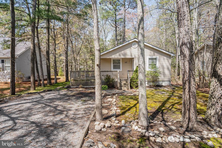Welcome to this stunning, renovated 3-bedroom, 2-bath single-family home nestled in the sought-after community of Ocean Pines. This move-in ready gem offers a perfect blend of modern updates and coastal charm, ideal for year-round living or a vacation retreat. Step onto the charming covered front porch, then enter to find brand new luxury vinyl plank flooring throughout, along with new interior and exterior doors that elevate both style and functionality. The spacious, open-concept kitchen is a showstopper, featuring new cabinets and hardware, elegant quartz countertops, a large island with pendant lighting, and brand new stainless steel appliances — perfect for entertaining and everyday living. Every detail has been thoughtfully updated, from the new light fixtures and recessed lighting to the new HVAC system that ensures year-round comfort. The crawl space has been newly encapsulated, adding peace of mind and energy efficiency and comes with a life-time transferable warranty. Located in the vibrant Ocean Pines community, residents enjoy an abundance of amenities, including: indoor and outdoor swimming pools, basketball and tennis courts, clubhouse and Yacht Club with boat slips for rent, boat ramp and private in-town Beach Club, Robert Trent Jones-designed golf course, Athletic Complex, skate park, playgrounds and tot lots, scenic nature trails and waterfront dining options. Some amenities requires owner to pay additional dues, please review HOA docs for more details. Whether you're looking for your forever home or a coastal getaway, this beautifully updated property offers the best of both comfort and lifestyle. Don’t miss your chance to own a slice of paradise in Ocean Pines!