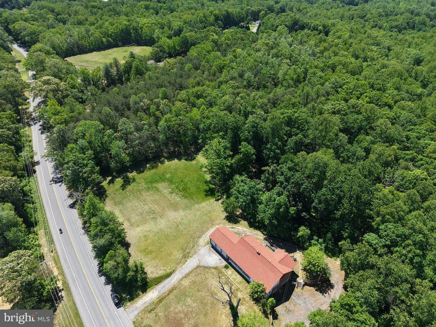 Coming back on the market soon Friday  March 13  th .!!!! 12 acres of  Country Living with Convenience   ….,  Rambling Rancher with 4 bedrooms, and Wow 5  garage bays Your view   from your  front veranda or 3 season room you will  enjoy the vista views of bucolic scenery The home is  located on 12.32ush wooded acres  plus circular driveway , plenty cleared area to install a pool and or park and store  all your recreational equipment, boats .kayaks RVs to enjoy ALL  these  Activities  —— just minutes from the Water -Trent Hall  River , Indian Creek  which lead right to The Chesapeake Bay ,  close  to  The Main Beach Park , This location has great accessibility   for  recreational water enthusiasts  and not to mention… but will …. a duck and goose  hunters delight area Other local activities   The Courteau  Vineyard , recreational horseback riding  also sooo  close to  comfort amenities shopping  , restaurants  grocery stores , gas stations The home features some newer systems updated AC and HVAC  and home generator, nice traditional  floor plan with generous room sizes , abundant  home storage opportunities attic ,basement ,garages and in the rooms and kitchen closets    Make an appointment and  make and  this  into your dream home  buyer to verify taxes and property sqft   tax record incorrect not updated yet to property split  !THIS HOME IS SOLD 'AS IS - NO REPIRS OR WARRANTIES note sign post out front but not   the panel realtor brokerage sign fyi wind took it will be replacing signage thx for your patience