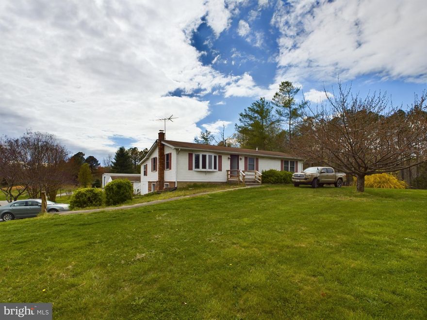 Discover endless potential in this expansive ranch-style home featuring 3 bedrooms, 3 full baths, a full basement, and a sunroom that spans the entire length of the house. Nestled on a generous 3-acre lot, this property also includes an oversized workshop garage perfect for any project or storage needs. Key Features: 3 Bedrooms, 3 Full Baths: Plenty of space for family and guests. Full Basement: A blank canvas for your imagination with beautiful wood stove—create a game room, home gym, or additional living space. Sunroom: Enjoy natural light all year round with a sunroom stretching the entire length of the home. Roof & Windows: Both approximately 10 years old, ensuring durability and energy efficiency. Furnace: Roughly 20 years old but in working order. This is a strictly AS IS sale, providing a fantastic opportunity for those ready to invest some sweat equity to turn this house into their dream home. Whether you're a DIY enthusiast or looking for a property with great bones to customize, this rancher offers the perfect foundation. Don't miss out on this unique chance to own a spacious home with a large workshop garage on a beautiful 3-acre lot. Schedule your showing today! *Please note the property is in process of being emptied.*