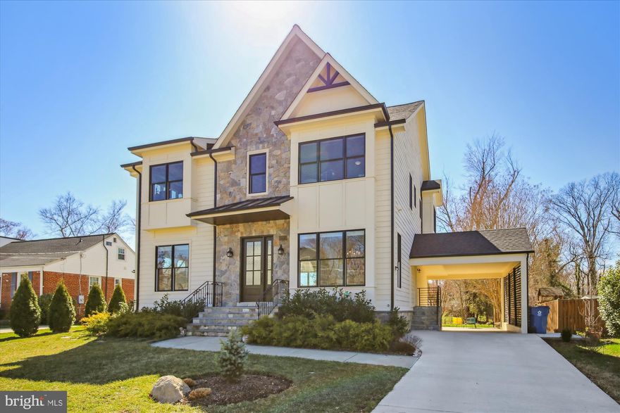 *GORGEOUS* 4BR/4.5BA home on 3 spacious finished levels - completely remodeled/rebuilt and expanded in 2019!  Fantastic McLean location! EVERYTHING about this home is top-of-the-line and has been designed with beautiful custom features and attention to detail. The magnificent main level features a large foyer area, formal dining room with wainscoting;  office/library; open-concept living room with coffered ceiling, built-ins and floor-to-ceiling stacked stone fireplace; fabulous gourmet island kitchen with large breakfast bar, modern custom Fabuwood cabinetry, quartz countertops, stainless steel appliances, Thermador 6-burner gas range and dishwasher.  This open, light and bright layout showcases 10-foot ceilings on the main level and 6” wide European plank oak hardwood floors on the main and upper levels. Upstairs boasts a large landing at the top of the staircase with 9-foot ceilings; expansive primary bedroom suite with 2 walk-in closets and a large en-suite with soaking tub, heated flooring, dual sinks, and a frameless shower. There are two nicely-sized additional bedrooms and 2 additional bathrooms, each with beautiful tile. The lower level features a warm and inviting family room, additional bedroom with a full bath and laundry space, plus walk- up to the covered carport. Lovely, level backyard includes a large patio for entertaining.  Additional features include crown molding,  recessed lighting, luxury window treatments,  tankless water heater, and double-hung Windsor windows.  SUPER LOCATION - near the end of a quiet street in the heart of McLean and blocks to nearby shopping, retail and restaurants. Perfect for commuters with quick access to DC, Tysons, Metro, & 495.  McLean HS pyramid!