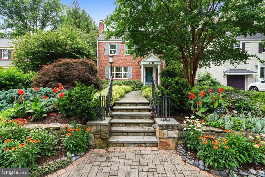 Welcome to the best secret in Chevy Chase.  Presented to the market for the first time in decades, this solid brick updated four-bedroom, two-and-a-half bath classic Colonial in Rock Creek Forest feels more like a retreat than a typical suburban home.

Mere steps to Meadowbrook Stables, Candy Cane Park, and Rock Creek Trail, this is a setting that delivers recreation and respite in equal measure, with curb appeal for days! Sited on a verdant lot resplendent with flowering trees and plants that frame the front facade and hint at the zen-like feeling that envelops the home. 

Inside, the layout offers an updated kitchen with quartz countertops, a breakfast bar, stainless appliances, and sight-lines that connect to the family room and beyond. A formal living room features built-ins with accent lighting, a fireplace, and oversized windows that flood the space with natural light. There’s also a dedicated dining area, and powder room on this level, creating a main floor that balances openness with purpose.

Upstairs, the bedroom level features three oversized bedrooms with double exposures and leafy views. The renovated full bath includes a walk-in shower with a spa seat, stone accents, and bold statement lighting that feels both luxurious and practical.

The lower level expands the footprint even further, with a rec room, guest room, full bath, and laundry area, all finished and well maintained. Out back, a brick patio and paved driveway extend the living space, with a ramp that makes for easy entrance and a large, well-integrated shed nestled among mature greenery. The Japanese-inspired garden turns every glance out the window into a moment of calm. Raked gravel, mossy corners, sculptural stone walls, and seasonal surprise plantings give the backyard its peaceful presence. The layered plantings, anchored by an elegantly contoured Japanese maple, create a sense of progression guiding you gently toward a home enveloped in zen-like tranquility.

For those who want room to entertain or support a professional work-from-home environment, the home was thoughtfully expanded to accommodate. It holds a legal use and occupancy permit for professional use, with smart features like ramp access, dedicated off-street parking, and a discreet back entrance. The layout offers a seamless flow between private and professional spaces, creating rare flexibility for remote professionals - think CPAs, financial advisors, educational consultants, or IT experts who host clients onsite.

Location-wise, 2723 Washington Avenue doesn’t get more connected. From here, you’re minutes to Silver Spring, downtown Bethesda, Rockville, and D.C., with easy access to commuter routes and public transit. Just steps away parks, schools and religious institutions, and the shops and restaurants along Grubb Road. 

Local private and public schools are near by; Rock Creek Forest Elementary, Silver Creek Middle and B-CC High Schools serve the neighborhood. An absolute treasure, well-maintained, expertly expanded and designed for today's lifestyles.

Sprawling just north of the D.C. line, Rock Creek Forest is a Chevy Chase neighborhood known for leafy streets, tidy homes, and a warm community vibe. Bordering Rock Creek Park, the neighborhood offers direct access to trails, playgrounds, and Meadowbrook Stables. Residents love extreme convenience to Rock Creek Forest Elementary (with Spanish immersion), B-CC High School with the IB program, and local community institutions. Local favorites include the Parkway Deli (hello pickle bar!) and the community-owned Rock Creek Pool. With easy access to downtown Silver Spring, Bethesda, and upcoming Purple Line transit, Rock Creek Forest blends nature, charm, and convenience in one tight-knit neighborhood.