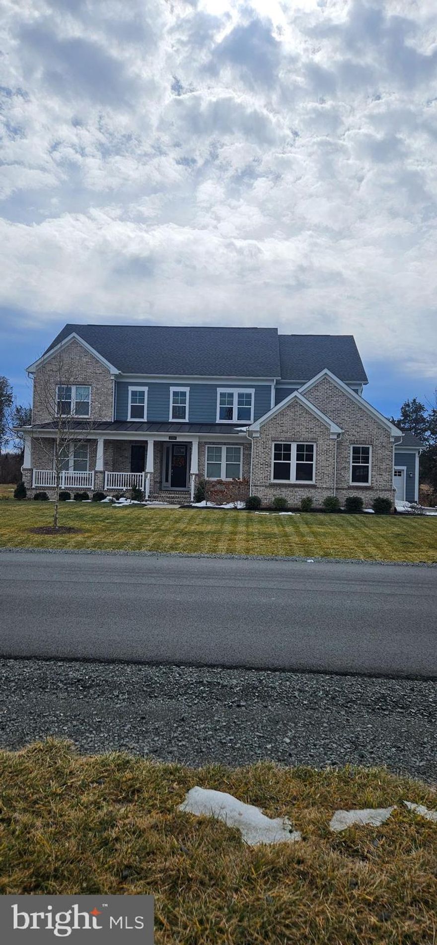 Nestled on a generous premium end/corner 0.44-acre lot that backs to trees and open fields, this exquisite residence, built in 2023, embodies the pinnacle of luxury living. This home exudes timeless elegance while offering modern comforts that cater to a sophisticated lifestyle. The expansive living spaces are bathed in natural light, creating an inviting atmosphere perfect for both relaxation and entertaining. With 6 full bathrooms and two half baths, convenience is paramount, ensuring that every guest feels pampered and at ease with over 6,600 square feet of beautifully finished living space. The main level features a large private office with an adjoining sitting room, a formal dining room with a butler’s pantry. The expansive gourmet kitchen, outfitted with sleek stainless steel appliances, an oversized quartz island, and a generous breakfast area, is ideal for both entertaining and everyday living. Also on the main level is a spacious laundry room with lots of cabinetry and a utility sink, a walk-in pantry, a built-in desk or homework area, and two conveniently located powder rooms. Upstairs is large enough to accommodate five bedrooms, each with its own private full bathroom, along with a second family room. The luxurious owner’s suite comes with dual walk-in closets, a glass-enclosed shower with bench seating, a linen closet, and a private water closet. The walk up basement, has been customized with a home gym, a billiards table area, and even a sauna room in addition to the large recreation room. Outdoor living is just as impressive. This home includes surround sound throughout and parking is a breeze with the attached 4 car garage, complemented by the  driveway and on-street options. This residence is not just a home; it's a lifestyle. Experience the luxury of space, privacy, and modern amenities in a setting that feels both exclusive and welcoming.  Embrace the opportunity to live in a property that harmonizes elegance with comfort, where every detail has been meticulously crafted to enhance your everyday experience. Convenient access to local wineries, the Cox Farms, historic towns, One Loudoun, Dulles International Airport, and Washington, D.C. This is more than just a house; it's a place to call home, where cherished memories are waiting to be made. Don't miss your chance to own this exceptional property.

Upgrades include :
-10-zone Rainbird irrigation system w/Rachio 3 smart sprinkler controller
-Active ASD radon mitigation system
-Basement wet bar/kitchenette with high-end appliances, including dishwasher, ice maker, beverage fridges, and floating dimmable LED shelves
-Tesla Gen3 Wall Connector charger
-Wireless security camera system
-Pet free/smoke free
-CAT-6 cabling throughout
-Outdoor gas line rough-ins and electrical outlets for future connections
-Recessed ceiling lights throughout
-4-car garage
-Access to VRE, Metro, and I66