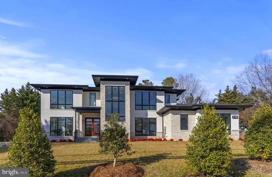 Open Saturday and Sunday!  Newly completed and absolutely worth the wait!  Introducing a breathtaking transitional contemporary home in the sought-after Spring Hill area of Langley in McLean. Beautifully sited on a premium, flat 1/2-acre lot, the home celebrates elegant open spaces, floor to ceiling windows, carefully curated designer fixtures, wide plank imported wood flooring and finished spaces that promise to please all the senses.  A true gourmet kitchen features Subzero and Wolf, built in Miele cappuccino & coffee System, dual dishwashers, and custom German Rehau cabinets. The kitchen opens to a breakfast area & spacious central family room with designer built-ins, a linear gas fireplace and glass doors opening to an impressive stone patio and large private yard. The home offers perfect work at home spaces with a main level sun-filled study and a main level bedroom suite possibly doubling as a second office. The side mudroom has electronic entry, cubbies with shelves and cabinets and a full bath with shower or dog-wash.  The open dining room will seat a large party and upon ascending the custom floating stairway, the upper level en-suite Bedrooms offer tremendous natural light, walk-in closets, premium baths with imported cabinetry and Cat5 cabling. The Primary Suite is stunning with floor to ceiling windows, a coffee bar, walk-in closets, and a Primary Bath that is truly amazing. The lower-level shines with a recreation room with a linear gas fireplace set in stone, Wet Bar, Game Area, proper Theater Room, Exercise Room, Storage Room and even a Wine Gallery.  A 3-level elevator is available as an option.  There are 10 ft ceilings on the lower and main level and 9 feet upstairs, an abundance of natural sunlight throughout the home and an attractive exterior elevation.  Features include a 3-car side load garage with remotely controlled glass doors, epoxy flooring, a 230-volt outlet for electric car charging, space for car lifts and plenty of extra driveway parking.  Underground irrigation, exterior landscape lighting and multiple security cameras all add to the complete package, and there’s even room for a pool. The smart house features include smart switches with wiring which allows lighting to be controlled remotely from a smart phone. There is a built-in speaker system, customized mood lighting in ceilings and under cabinets, electronic door entry, a whole house surge protector and prewiring for a generator. Verizon 1GB fios service is pre-installed with the option to add 1 GB wireless repeaters to the main and upper level for maximum internet speed.  Owners will love the private half-acre lot and can enjoy a very short stroll to the amazing Spring Hill Recreation Center.  Located in the celebrated Spring Hill, Cooper, Langley school pyramid, the home is extremely well positioned allowing for a very short drive or bike ride to Metro, Tysons Corner, downtown McLean, Washington DC, and less than 30 minutes to two major airports.