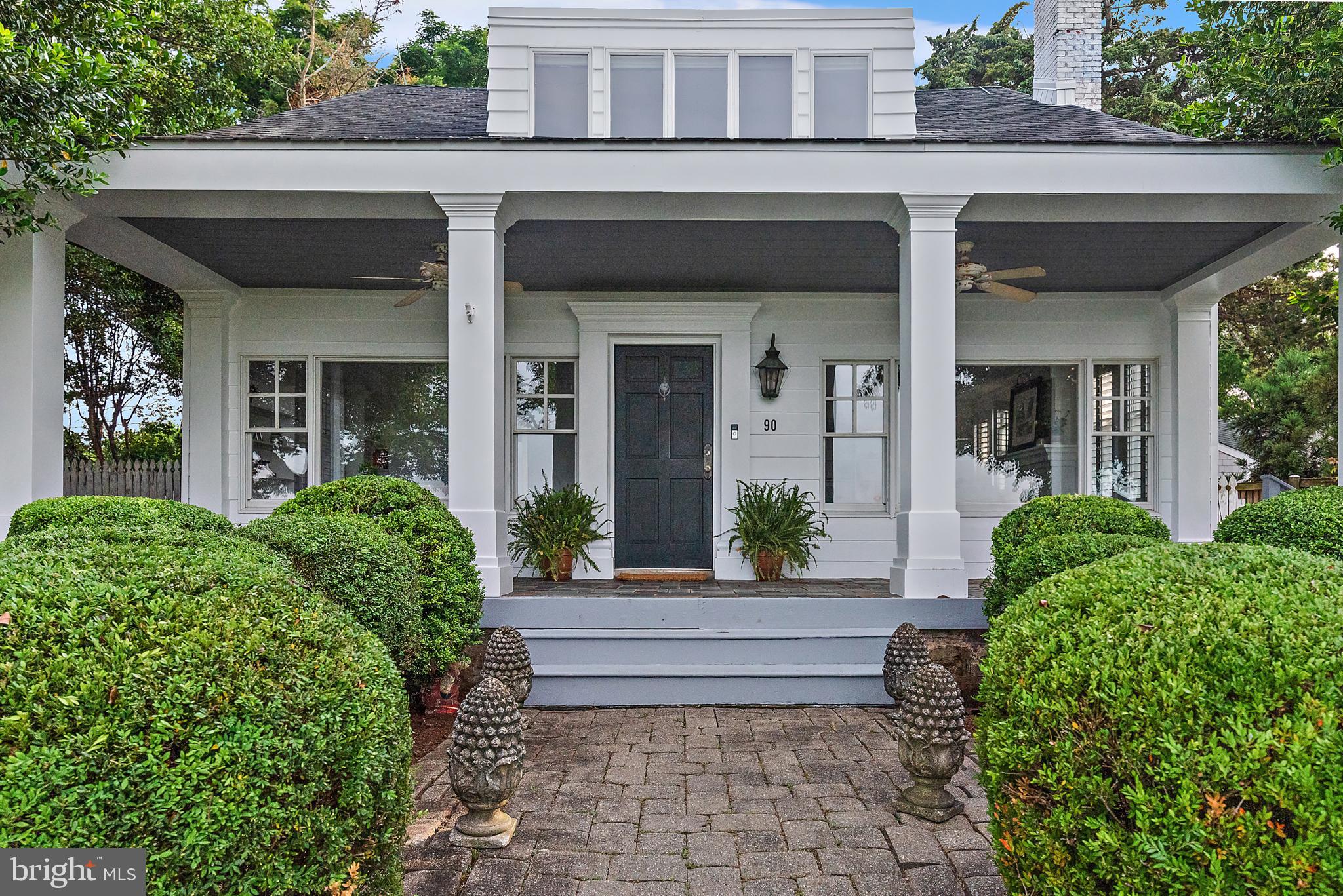 Coastal Charm with Iconic Views | 90 River Drive, Bay Ridge
Experience timeless waterfront living at 90 River Drive in the heart of Bay Ridge, Annapolis. This beautifully appointed 3–4 bedroom home features a detached carriage house, ideal for guests, a home office, or a studio space. Enjoy breathtaking views of the Bay Bridge and direct access to one of the area’s most spectacular private beaches. Nestled in a vibrant coastal community known for its sailing, beach walks, and friendly charm, this property offers a rare blend of lifestyle, location, and flexibility.
The highly sought-after Bay Ridge community in Annapolis offers a rare blend of resort-style amenities and vibrant coastal charm. Residents enjoy a scenic community pool and clubhouse overlooking the sparkling waters of the Chesapeake Bay, as well as private community beaches on both the Bay and the River. Boating enthusiasts will appreciate the community marina, complete with a newly renovated clubhouse.
For those who prefer land-based recreation, Bay Ridge features basketball courts, ball fields, pickleball courts, playgrounds, and open green spaces, along with a year-round calendar of community events. Whether you’re walking or biking along miles of waterfront paths, the Bay Ridge lifestyle is truly one-of-a-kind.
Located just minutes from downtown Annapolis and Eastport, Bay Ridge offers the perfect balance of small-town charm and big-city access. Commuting is easy with nearby access to Routes 50 and 97, connecting you directly to Baltimore, BWI Airport, Fort Meade/NSA, and Washington, DC. And when it’s time for a getaway, the Eastern Shore and ocean beaches are just a short drive across the Bay Bridge.