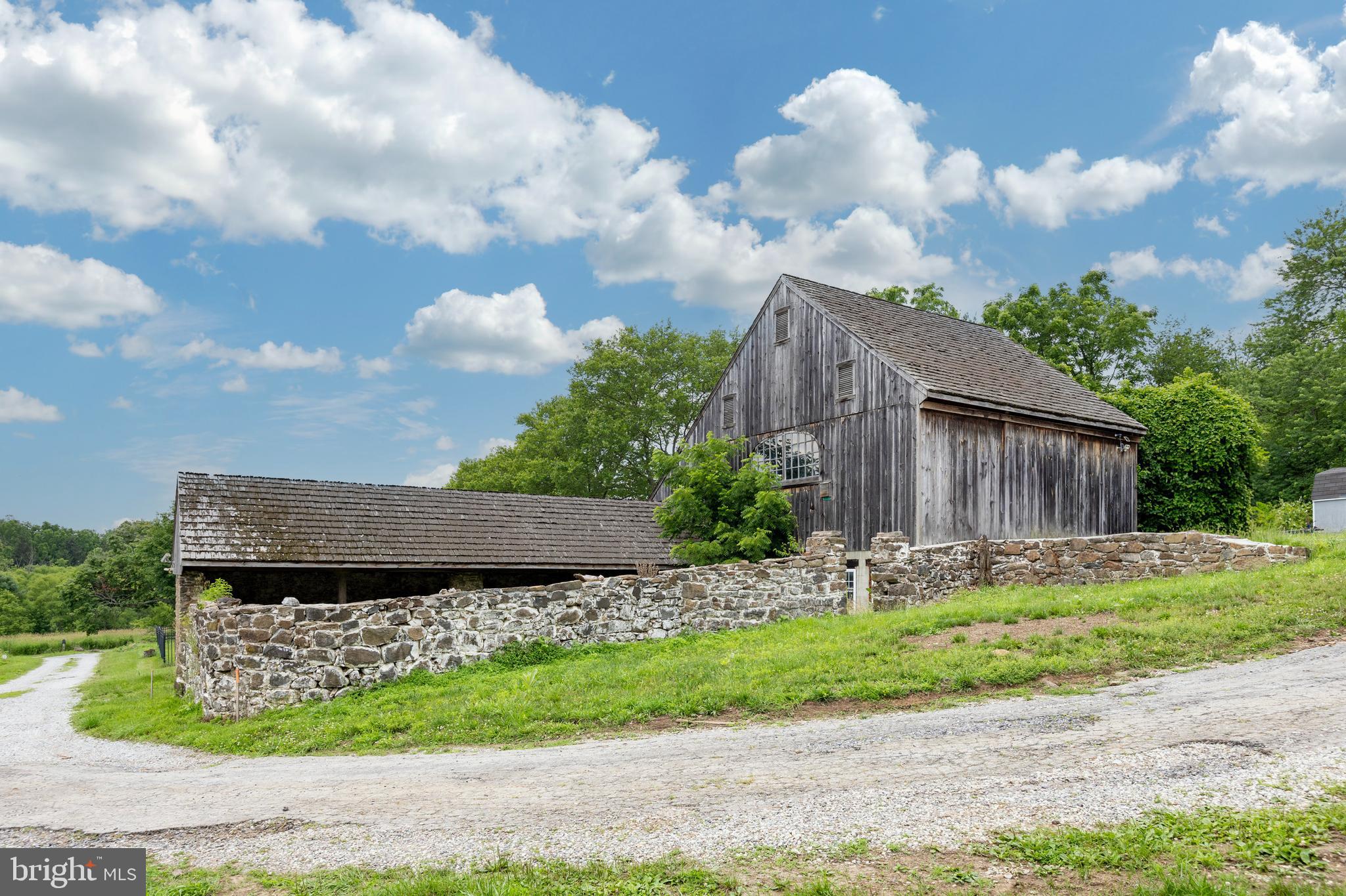 Endless Possibilities Await at This Historic Barn Property
Bring your vision to life with this rare opportunity to transform a classic barn into a one-of-a-kind residence or custom retreat. Nestled in a scenic and sought-after location, this charming structure is ready to be reimagined...offering the perfect canvas for your dream home.
Offered by Zappitelli Homes, a premier custom builder known for quality craftsmanship and thoughtful design, this project promises a seamless blend of historic character and modern luxury. Whether you're dreaming of exposed beams, soaring ceilings, or rustic finishes with contemporary flair, Zappitelli Homes can bring it all to life...tailored to your unique style and needs.
The groundwork is set. Now it’s time to make it your own.
Contact us today to explore the possibilities and schedule a private tour of the property with the builder. Go with Zappitelli's plan or create your own! GPS - 301 Reservior Rd, West Chester