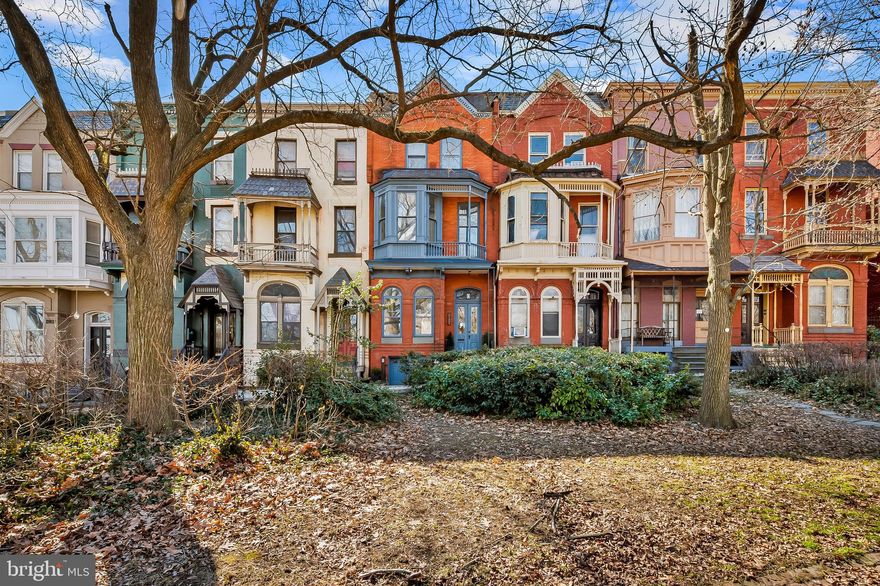 Welcome to 1910 Mount Royal Terrace in historic Reservoir Hill. Built in 1884, this elegant townhome is an example of the Victorian Eastlake style of architecture, featuring an ornate brick facade with a second floor bay window and balcony. 

The interior features 4 finished levels of living space. On the main level, you will find 10.5 ft ceilings, pocket doors, original hardwood floors, two decorative fireplaces, a large dining room, a half bathroom, a gorgeous updated kitchen with center island, plenty of cabinet storage, gas stove, and tin ceiling. From the kitchen, walk out to a private fenced in rear patio. 

The basement features its own full bathroom, kitchen, bonus room,  and walk out to rear patio. This would make a lovely guest suite or separate apartment. 

On the second floor, there are two spacious bedrooms, a connecting dressing room, a laundry area, and a full bathroom. The front bedroom has refinished hardwood floors, a decorative fireplace, built in bookshelves, bay windows, and private balcony. The rear bedroom has new carpet, and bay windows overlooking the rear patio. 

The third floor features an open layout, separate bar area with cooktop, sink, and mini fridge, half bathroom, and living space/ third bedroom with two skylights, hardwood floors, fireplace, and floor to ceiling built in bookshelves. 

You will love this convenient location with easy access to I-83, the Light Rail, and Penn Station for MARC/Amtrak for DC/NYC access. ⁣ Druid Hill Park, Rawlings Conservatory, and The Maryland Zoo are all a few minutes away! Enjoy nearby restaurants including The Tilted Row, Cookhouse, Noona’s, Llama’s Corner and On the Hill. Nearby Station North is full of dining options such as Alma Cocina, Foraged, the Royal Blue and Le Comptoir du Vin. 

Situated close to the Lyric, the Baltimore Symphony Orchestra, and the Charles movie theater. 

Easy access to MICA, University of Baltimore, JHU Homewood campus and University of Maryland's Hospital and Law School.