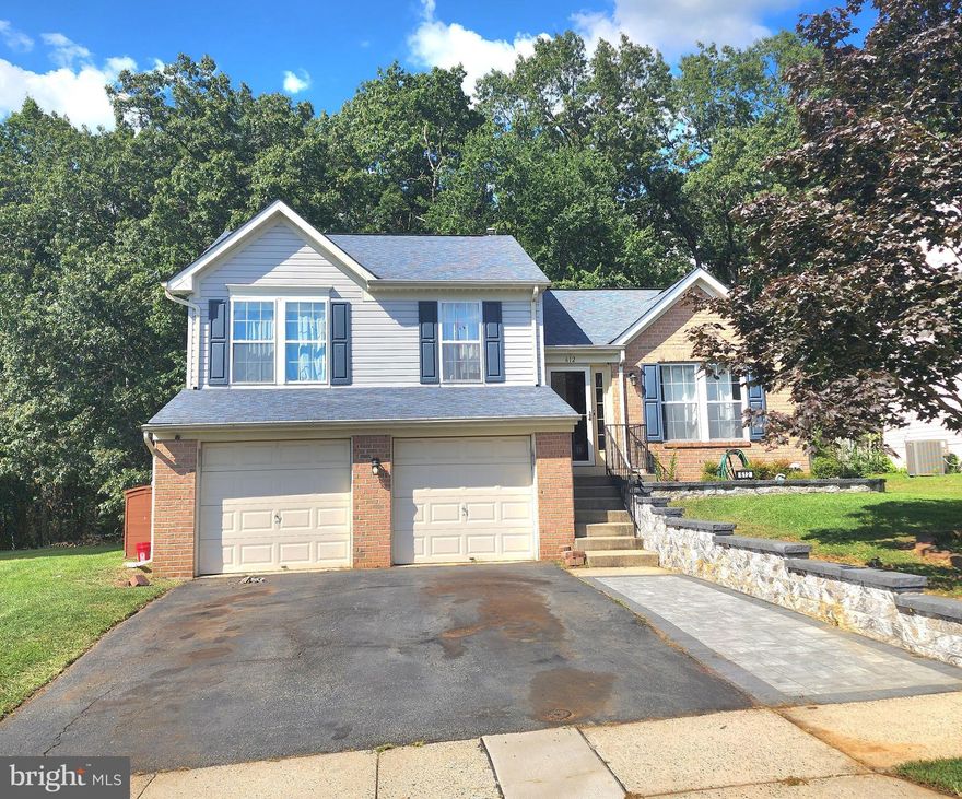 DREAM BIG!! This spacious bi-level home offers a ton of flexibility with multiple areas for living space.  A 360 sq ft addition was recently added, bringing a second living space to the main level, while adding additional cabinet storage for the kitchen.  The addition brings in a ton of natural light with brand new casement windows throughout and high ceilings.  There is decking off of the addition leading to a new patio area in the fenced in back yard.  A third above grade living space is just down a small set of stairs off of the living room when you first enter the home.  This area offers a half bath and access to the outdoor patio is  available from this space.  There is also a basement with an option for a 4th bedroom that is already finished for you.  The upper level has 3 bedrooms with a full bath in the hall as well as in the primary bedroom.  The roof and HVAC are both less than 7 years old.  There is a brand new mini split installed in the addition area on the main level.  The dishwasher, fridge and upstairs toilets have recently been replaced as well as the carpet leading to the upstairs, in the hallway and 2 bedrooms. Don't miss the attached two car garage that can be used for parking, a workshop or additional storage.  Additional inclusions:  Oversized pergola out back, and cabinets outside of the kitchen. Sellers are offering a $1500 credit for flooring on the lower level.