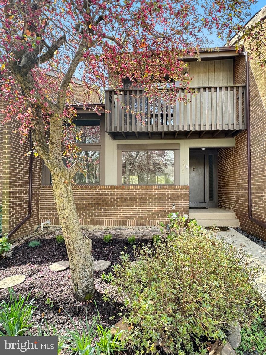 Welcome to this rare find in Reston! This modern 3-bedroom, 2.5-bathroom home boasts an inviting open layout with a wood-burning fireplace, large windows, and vaulted ceilings for a spacious feel. The separate dining room leads to a huge deck overlooking the woods and Reston National Golf Course. The kitchen offers ample natural light and offers space for a dining table. Upstairs, you will find the primary bedroom with a private balcony, along with two additional full-sized bedrooms and a beautifully updated bathroom with new tile floors, toilet, and vanity. The finished lower level features a spacious family/recreation room with another wood-burning fireplace and sliding glass doors that open to the fenced backyard. There is also a full bathroom and a large laundry/utility room with ample storage space. Recent updates include new carpet and paint throughout the home. Enjoy access to Reston's amenities, including community swimming pools, tennis courts, basketball courts, a community center, multiple lakes, and miles of paved walking paths, including the W&OD Trail. Conveniently located near the Metro Silver Line, Reston Town Center, and Washington-Dulles International Airport, this home is within walking distance to elementary, middle, and high schools. With two assigned parking spaces and plenty of guest parking available. Do not wait this one will not last long!