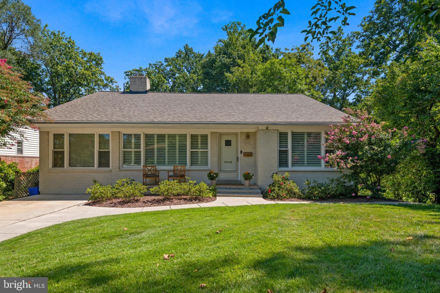 **Showings to begin Friday 8/26 at 10 am** Welcome home to 9403 Holland Avenue, a meticulously maintained and updated home in the desirable Maplewood neighborhood of Bethesda. This four-bedroom home (with the potential for a fifth bedroom in the loft area) features large living space on the main level with soaring 12-foot ceilings and a large picture window, allowing for natural light to flow into the room. The main floor office overlooking the manicured front lawn will make working from home a delight! The custom-designed, well-appointed, updated kitchen overlooks the dining area with bar seating. The kitchen features solid wood cabinetry with quiet close drawers and cabinets, some with pull-out shelving. The stunning, seamless, Brazilian granite countertops create quite the focal point in this kitchen space. A gas range, French door refrigerator, both a whole house and ANSI Standards 42&53 filter on the instant hot water dispenser add to the features of this custom space. Meal prep will be a delight in this lovely kitchen!
The upper-level features hardwood floors throughout the three bedrooms. The primary bedroom, with an ensuite bathroom, overlooks the manicured backyard, making this room a welcome retreat. Two generously sized closets round out this bedroom. The additional two bedrooms are generous in scale and have views of the backyard – abundant closet space is also a great feature in both rooms. The gleaming white and navy-blue tiled hall bathroom has a large bathtub for soaking away the day’s stress. Do not miss the fun loft space (with bedroom potential!) complete with a built-in dresser and desk area, closea t, and attic storage.
The above grade, lower level, of this charming home features a large family room, with walk-out to the rear yard and another large picture window. A stone-faced, gas fireplace, will make this the place to cozy up during the winter months to watch your favorite movie! The 4th bedroom with ensuite bathroom is also located on this level, as is the laundry room, which has another door to the backyard. Down a few steps is yet another unique feature of this home … just over 600 square feet of fully insulated storage space. With 6-foot ceilings to call it a crawl space truly does not do it justice!
The backyard is a quiet oasis with mature trees and plantings as well as a patio space – perfect for al fresco meals! Through the bamboo trail, on the lower 50 feet of the yard you will find one of two large storage sheds – with maintenance-friendly siding, French doors, and 2 skylights! Another storage shed is conveniently located on the patio. Perfect for storing your bikes after a ride on the nearby Rock Creek Park which is  closed to cars on the weekends for pedestrians and cyclists to enjoy all the park has to offer. Another storage shed is conveniently located on the patio.
It is not an exaggeration to say this home's neighborhood is central to the city of Bethesda, with even the adjacent Bethesda Meeting House - for which the surrounding city was named - being on the edge of the neighborhood. Easy auto access to 495, within a mile walk to the Metro, or via bike downtown on the Capital Crescent trail - commuting made easy in the DMV.  Walk to Maplewood Park with its large recreational fields and playground or join the nearby YMCA with indoor and outdoor pools and tennis and pickleball courts. NIH and Walter Reed are also easily accessed within a mile of the property. Grocery shopping, restaurants, and unique boutique shopping are minutes away in Wildwood Village or downtown Bethesda.
Please see the disclosure packet for a detailed list of improvements to this home including a new roof in 2022!