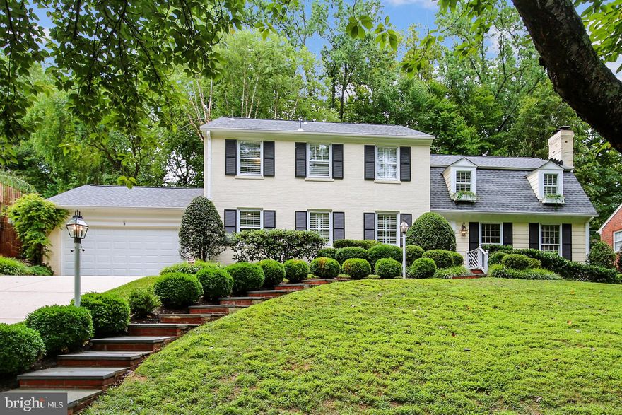 Welcome home! Gorgeous classic brick Colonial with wonderful curb appeal featuring a lovely landscaped yard and flagstone walkway located in the beautiful and coveted River Falls neighborhood! Charming brick paver foyer and hardwood flooring throughout. Spacious living room with a wonderful wood burning fireplace. Elegant large formal dining room. Bright and cheery sunroom addition with vaulted ceiling and skylights. Delightful kitchen with plenty of cabinets, top of the line appliances, and granite counter tops. Adjacent breakfast room with ample table space and bay window. Spacious family room with painted brick fireplace with wood stove and built-ins. Separate wet bar and adjacent powder room. Spacious and coveted home office and/or 5th bedroom with custom built-ins! Mud and laundry room entrance off garage. The family room, kitchen and sunroom all open to the resort-like backyard patio outdoor space. The upper level boasts 4 bedrooms (with possible 6th). The spacious master suite includes a separate dressing/living room with plenty of closet space and a stunning renovated master bath addition with shower and soaking tub!  Beautiful renovated hall bathroom. The finished basement includes a full bathroom and two large storage closets. This amazing home also offers an attached spacious two car garage! AND, brand-new 30 year architectural shingle roof! This meticulously maintained home is close walking distance to the popular River Falls community club featuring a swimming pool with a proud swim team, tennis courts offering clinics for the entire family, playground, athletic fields and basketball courts. Hiking and biking along the C&O Canal leads you to Great Falls or to Georgetown/DC.  This neighborhood is ideally situated near Potomac Village and offers easy access to I-495 and I-270, downtown Bethesda, Washington DC, and Virginia. Carderock Springs/Pyle/Whitman schools and close to many private schools as well!  A must see!