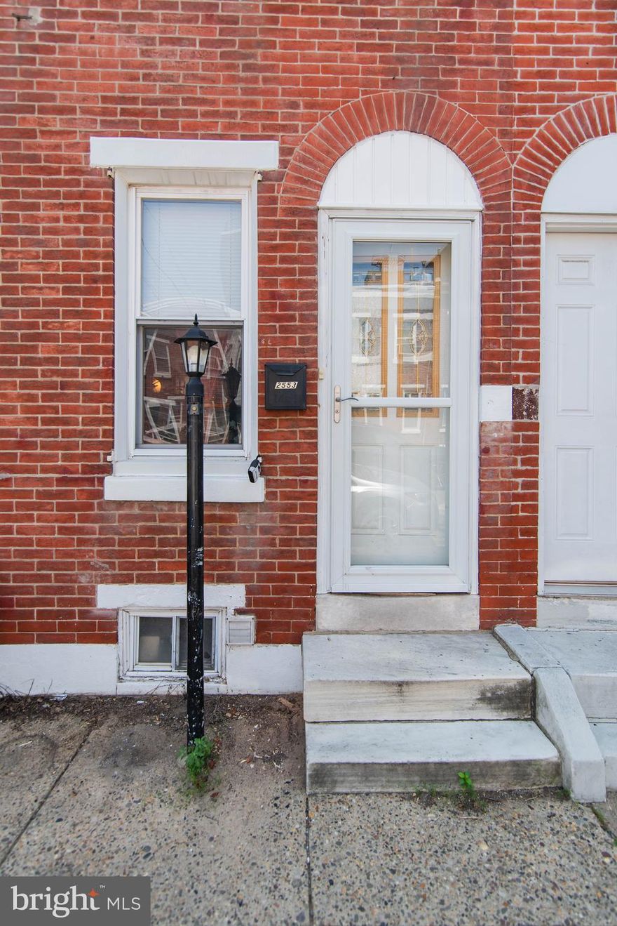 This charming interior row townhouse in Fishtown, built in 1914, offers a blend of classic character and modern potential. The straight-thru layout features wood flooring throughout, enhancing the inviting atmosphere. Enjoy the convenience of an eat-in kitchen and ceiling fans for added comfort. The full, unfinished basement provides ample storage or the opportunity for customization. Step outside to a cozy rear yard, perfect for outdoor gatherings or gardening. The property is equipped with exterior lighting and sidewalks, ensuring a welcoming environment. On-street parking is available for residents and guests. Located in the vibrant Fishtown neighborhood, this home is just moments away from local shops, restaurants, and parks, making it an ideal spot for those seeking a lively community. Experience the best of urban living with easy access to public transportation and nearby amenities. This property presents a unique opportunity to create your dream home in a sought-after area.