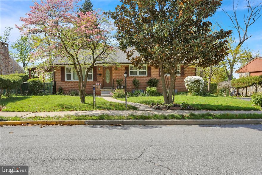 Located in Hampden Heights, this ranch home offers 3 bedrooms and 2 full bathrooms with a functional layout and multiple living spaces. The main level features original hardwood flooring throughout much of the home, along with a spacious living room filled with natural light. The kitchen includes a gas cooktop, double oven, dishwasher, and ample cabinet space, with access to a side entrance highlighted by a pergola.
A finished basement with a private entrance provides additional flexible space for a family room, recreation area, bedroom, or home office. Outdoor features include a fenced yard, covered rear wooden deck, and a side pergola area for additional outdoor use. The property also offers gated parking, an attached garage, and a storage shed for lawn and garden equipment. Additional updates include a roof installed in 2018, along with newer water heater, heating system, and central air conditioning. This home will not last long. Schedule a showing today!
