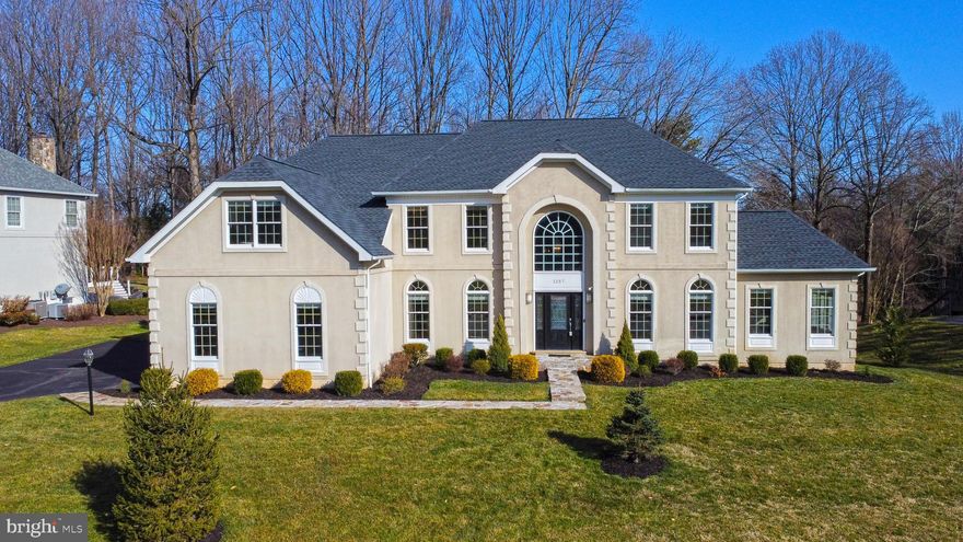 Welcome home to  this spectacular property that awaits you in the popular community known as the "Estates at Great Falls Crossing".  This GRAND estate home is sited on a substantial sized .68 acre lot that offers a tranquil and peaceful setting and backs to common area space and community pond. Enjoy this private oasis of Mother Nature views of green space from the kitchen window and enjoy serene views of the trees and common area space. The back yard is ideal for outdoor play/pets.   There is a small fenced area around the patio. The "Grand Chateau" model, built by well-known builder Toll Brothers, offers 9' ceilings with an open and flowing floor plan that provides a variety of living areas. The elegant two story open-foyer with hardwood floors and extensive crown molding welcomes you at the beveled glass front door.  Entertain in the generous sized living room with perfect flow into the gracious sun room that boasts a cathedral ceiling and abundance of windows for natural light!  Work from home in the handsome office with a VIEW and custom built-in cabinets. Gather in the spacious family room and get cozy next to the stunning floor to ceiling stone gas fireplace. Note special floor level lighting installed in the family room.  The gourmet kitchen is adorned with granite countertops, stylish pendant lights, white cabinetry, under cabinet lights, backsplash with hand made Italian tile accents, SS appliances with wall oven and convection oven, and island with down-draft gas cook top. Natural light pours in thru the massive skylight.  Easy access to the charming flagstone patio for grilling and delightful outdoor living.   The formal dining room offers more space for entertaining options. The laundry room is equipped with front loading pedestal washer/dryer, storage cabinets and is located  just off the kitchen. Two staircases lead you upstairs.  The owner's suite is gigantic with molding, sitting area, dream dressing room, two walk-in closets and decorative tray ceiling.  Enter the light and bright luxurious ensuite full bath with dual sinks, skylight, soaking tub, steam shower and heated floor.
You will find a second bedroom with ensuite full bath along with the third and fourth bedrooms with jack-n-jill bath. The sizable finished lower level, with walk-up stairs, offers two bonus bedrooms/office/flex suites.  Spacious  full bath with dual sinks and steam shower.  Fantastic granite bar equipped with a sink, small fridge and dishwasher. Massive storage closet to stay organized. Hang out in the media area with a gas fireplace. You will find another bonus room that can be used for yoga/stretch/gym or craft/hobby room. Abundance of storage space. Generator installed for protection if loss of power. The neighborhood is well established with mature trees, landscaping and sidewalks. (note that there are 3 ways in and out of the neighborhood.) Spend summer days at the community pool! This private retreat is conveniently located near the Dulles Toll Road, Rt. 7, 495 and Dulles Airport.  The Wiehle Silver Line Metro station is just minutes away. You will find the Reston Farm Market, Lake Fairfax and NOVA Wild zoo, just around the corner! Close to the W&OD bike trail, Tysons, Reston Town Center, Reston Hospital and Home Depot! Approximately 20 miles to Washington, DC.   Updates: Carpet (2024), two HVAC's (2010),  SS dishwasher (2023), oven (2022), roof (2022), kitchen cabs painted (2024), interior painting (2024), garage floor painted (2024) equipped with smart lights, ring cameras, CAT 6 wire and 10-zone irrigation system.  Welcome home, I think you will want to stay!**see video icon for 3D virtual tour!**