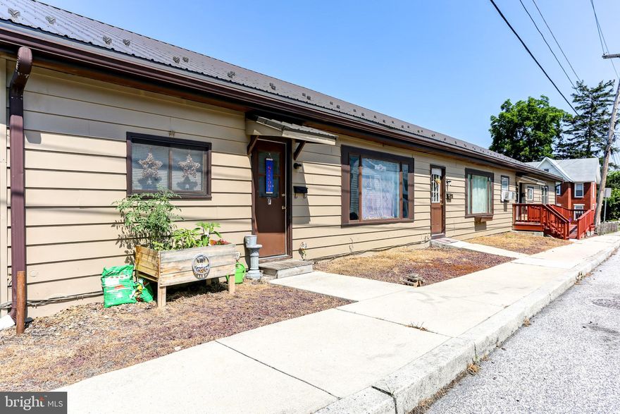 Located on a prominent street in Dillsburg, this multi-family property offers an excellent investment opportunity with six well-maintained two-bedroom, one-bathroom apartments. Each unit features electric baseboard heating, individual washer and dryer hookups, and updated amenities including a new metal roof. Tenants are responsible for electric, while water and sewer are included in the rent. Off-street parking is available in the rear of the building, with additional street parking in front, adding to the convenience for residents. This property combines location, functionality, and value in one turnkey package.