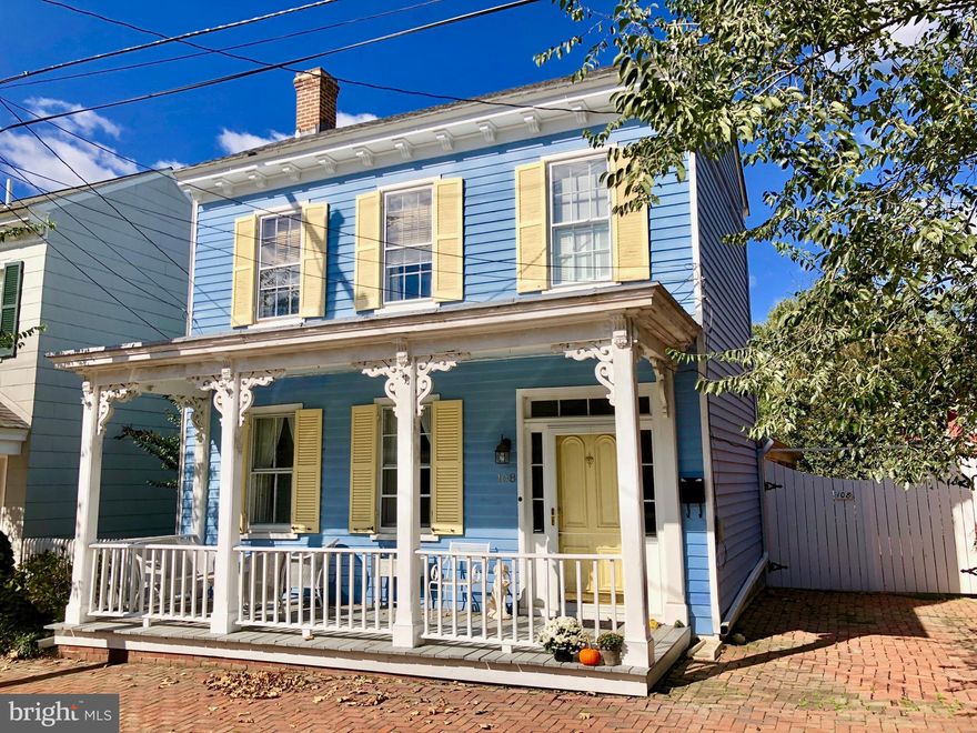 Iconic Mill Street home, this "Folk Victorian" has been lovingly maintained & thoughtfully upgraded while maintaining the historic features: refinished Heart Pine flooring throughout, crown moulding, chair rails, built-in shelving, & an extra-long claw foot soaking tub . Upgrades include high-velocity HVAC, blown-in insulation (walls, attic, & cellar), granite counters & new cabinetry in the kitchen, tiled bathrooms, dressing room off the Master bedroom with a walk-in closet,  & encapsulated cellar. The backyard oasis is private, quiet, & low-maintenance; seasonal trees & plants bloom three seasons of the year. The garden shed & shop is tucked away, but offers great storage & work space. Situated in the heart of Downtown Chestertown, take a peek at this home soon!