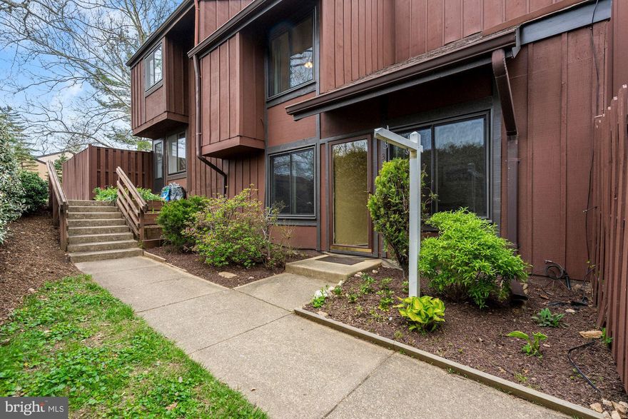 Welcome to 3107 Babashaw Ct!  This bright and sunny end unit town home features 3 bedrooms and 2 full bathrooms! The main level includes a spacious living area with two story ceilings, dining area off the kitchen and bedroom or optional home office/den space.  There is also a full bathroom and laundry on the main level.  Access the fully fenced private patio from this level and enjoy your morning coffee outdoors!
Upstairs you will find the primary bedroom with access to the full bathroom as well as a third bedroom. New carpet, new kitchen floor and several rooms freshly painted.   Heat Pump was replaced in 2021. Super close and an easy shortcut to Mosaic District and Pan Am Center via Covington Street.  Walk to Vienna metro! Plenty of parking in this lovely, secluded community in an unbeatable location!