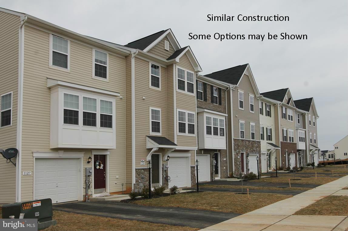 Dan Ryan Builders at Stonebrook Village offers this York II garage townhome finished on all 3 levels with lots of stylish features like stainless appliances & upgraded cabinets in the island kitchen, deluxe master bath with double vanity & separate soaking tub, walkout lower level rec room! Convenient to I81 for your commute to MD destinations & nearby shopping. Ask about closing cost help!