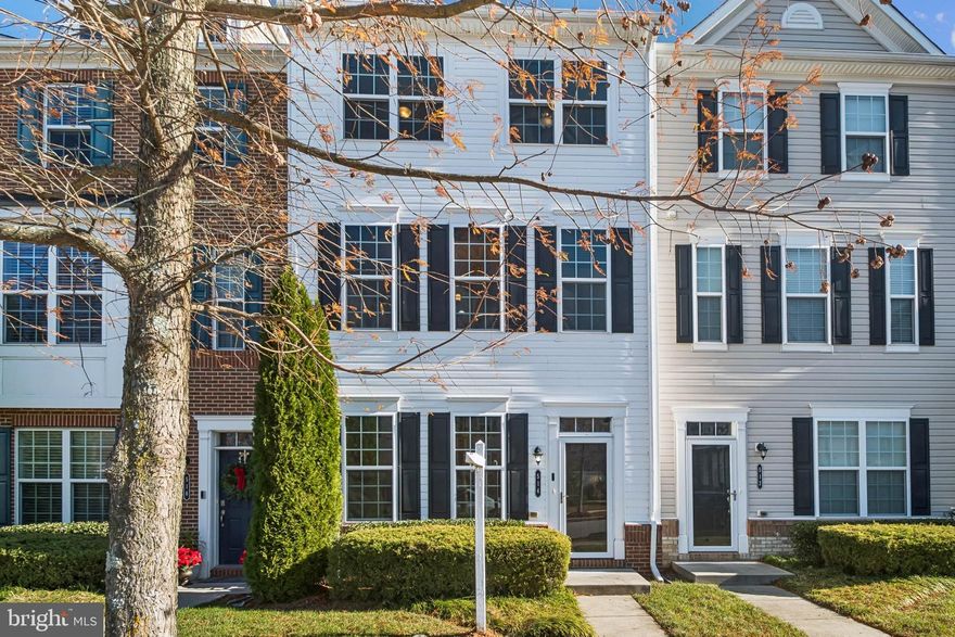 Beautiful interior townhome perfectly positioned on one of the most desirable lots in Quarry Place. The entry level features a welcoming flex space ideal for a sitting room or home office, along with a stylish powder room and access to the 2-car garage, which includes generous attic storage.

The main level offers 9' ceilings, abundant natural light, gleaming hardwood floors, and a spacious kitchen highlighted by an 8' island, coordinating backsplash, and a built-in bar area—perfect for entertaining. Another conveniently located powder room completes this level.

The upper floor includes two well-appointed bedrooms, a full hall bath, and a laundry area with washer and dryer. The primary suite is a true retreat, providing comfort and privacy. Additional features include recessed lighting throughout, a full sprinkler system, and Energy Star certification for added efficiency.

Quarry Place residents enjoy a scenic walking/jogging trail around the lake, a community dog park, picnic areas, and more. This home offers both luxury and lifestyle—move-in ready and impeccably maintained.