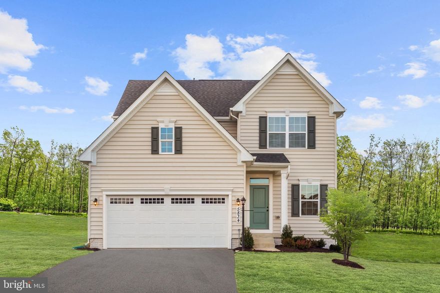 Chapman Fields is the only new construction single family homes in the area. You will find a quiet, tucked away community with walking trails, forest conservation and endless convenience!  Enjoy plenty of nearby shopping, dining and entertainment. Plus it is convenient to I-695 and route 26, only 25 minutes from downtown Baltimore and 10 minutes to the Metro and Foundry Row. The BALLENGER floor plan offers up to 5BR/3.5BA. Not too big, not too small. The Ballenger is just right with the ideal amount of space that delivers on flexibility. Enter through the covered porch into a flex room - you decide how it functions. A huge modern island in the kitchen flows neatly into the dining area and family room. Upstairs, the primary bedroom offers two separate closets. Choose four bedrooms or turn one into a loft. For even more space, finish the basement with another bedroom and a wet bar. Photos are representative only.