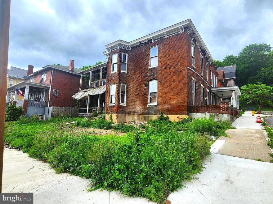 OPPORTUNITY AWAITS! Are you a visionary ready to bring new life to a property bursting with potential? This large brick structure offers the perfect canvas for your next big project. Whether you dream of creating a spacious single-family residence or converting it into a multi-family investment, the possibilities here are truly endless. A full rehab is needed, but with the right touch, this property could become a standout in the neighborhood. The seller is offering this opportunity along with the adjoining unit -308 E. Harrison St.(separate MLS #), giving you even more room to expand Opportunity Awaits! your vision. Located just minutes from downtown Cumberland, with quick access to I-68 East or West, and close to medical facilities, restaurants, and shopping—this location is as convenient as it is promising. Bring your imagination and your tools—call today to schedule a tour and explore the potential of this "Diamond In The Rough". Property being sold AS-IS.