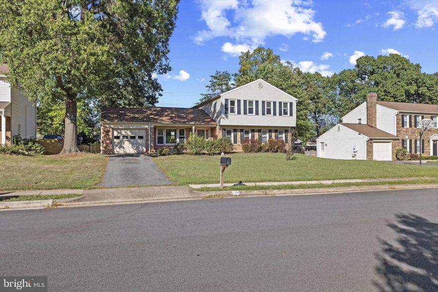 OPEN HOUSE SUNDAY 2 - 4  ::  Rare and exciting opportunity to purchase this fantastic, updated, 5 Bedroom, 3 full and 1 half bath home located on a peaceful cul-de-sac in the quiet neighborhood of Forest Ridge in Sterling, Virginia. Newly painted throughout, this home features a primary suite with en-suite bath on the main level of the home. There is ALSO a second primary bedroom on the second level with an en-suite bath and a large walk-in closet. Three large bedrooms with plenty of closet space and a full hall bath complete the upper level.  Enjoy the large living room with a fireplace and views of the deck and fully fenced large rear yard. The open kitchen floorplan is amazing for cooking and hosting!  A dedicated laundry room with a utility sink on main level has direct access to the attached garage.   Sit on the front porch and appreciate the quietness, convenience, and privacy of the neighborhood. Close to the Washington-Old Dominion Trail with its 45 miles of paths. Approximately 6 miles to Dulles Airport for easy out-of-town travel. Golf, shopping and restaurants nearby.  Fantastic opportunity!
