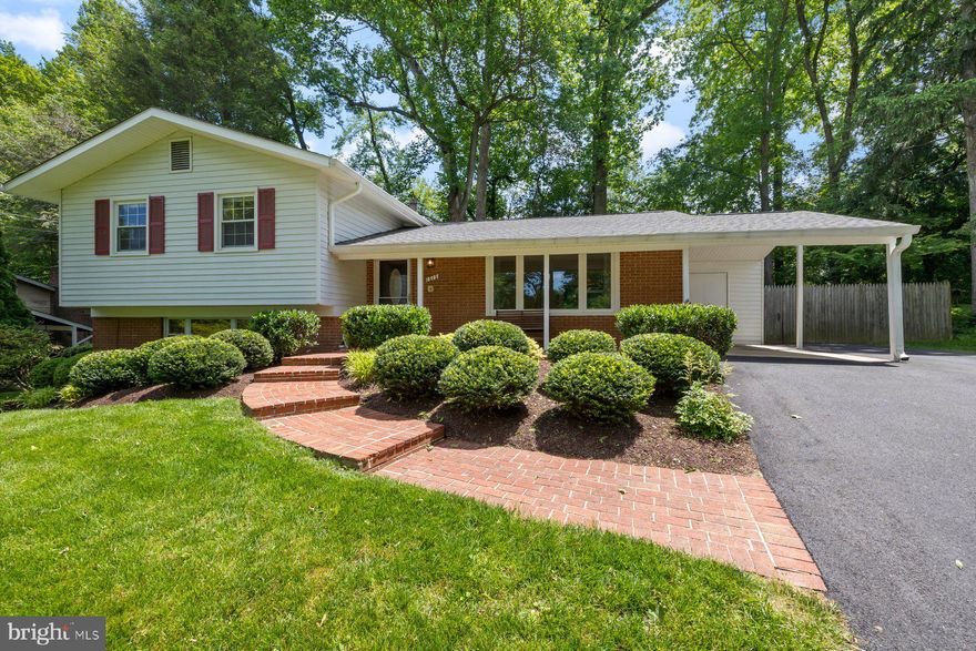 **OPEN SAT 6/7 12-3 PM & SUN 6/8 12-3PM** Welcome to this beautifully updated 4-bedroom, 3-bathroom home tucked away on a peaceful dead-end street in Silver Spring. This spacious four-level split offers over 2,700 square feet of thoughtfully renovated living space, perfect for today’s modern lifestyle. Step inside to gleaming hardwood floors and a sun-filled main level featuring a fully remodeled, eat-in kitchen with upgraded 42” cabinetry, Silestone countertops, and stainless steel appliances. A new sliding glass door (2024) leads from the dining area to an entertainment-sized deck overlooking a fully fenced backyard with custom-designed, low-maintenance landscaping.

The walk-out lower level is ideal for multi-generational living or remote work, boasting a large family room with a brick hearth fireplace, custom built-ins, a private 4th bedroom with separate entrance, and 4th full bath. A second lower level offers additional flex space with built-in shelving—perfect as a rec room, home gym, or hobby area. Recent updates include a new roof (2020), refinished driveway (2021), and modern appliance upgrades like a French door Samsung fridge (2021), microwave (2020), and washer (2021). An attached carport with built-in storage and parking for up to six vehicles adds convenience and functionality.

Perfectly located just minutes from downtown Silver Spring, Bethesda, and Washington, DC, this home offers easy access to top-rated dining, retail, and parks, as well as key commuter routes including I-270, ICC, and I-495. With central access to all three major airports—Reagan National, Dulles, and BWI—this home blends comfort, convenience, and versatility in one of Montgomery County’s most desirable neighborhoods.