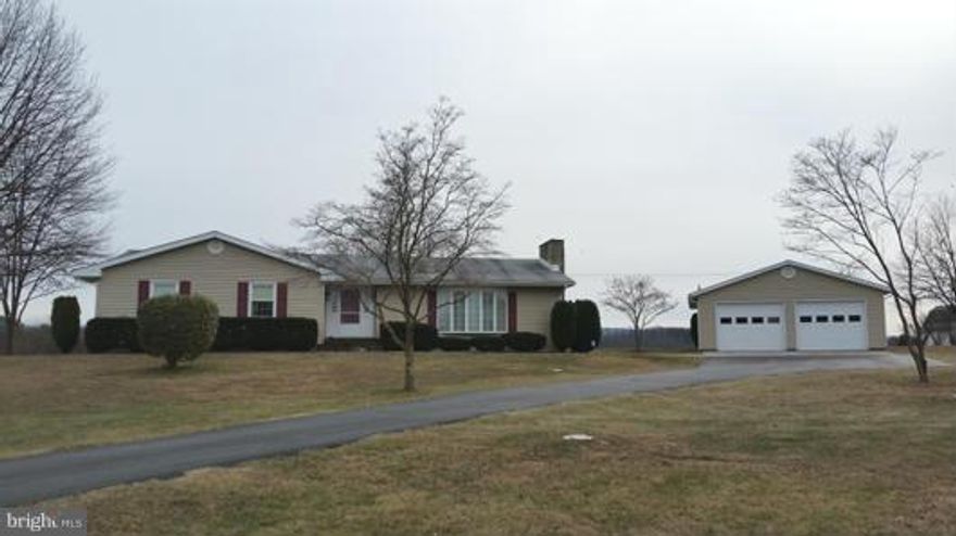 Spacious Rancher on 5.5 acres with detached 2 car garage, paved drive, views and a pond. Home features large sunken living room, fireplace, master suite, separate dinning room, sun room. Lower level has family room, work shop, kitchen, bath, spare room, could be a Mother-in-law apt. Maintained to a high standard with newer roof, new heat pump, windows, siding, water softener. Ready to enjoy now!