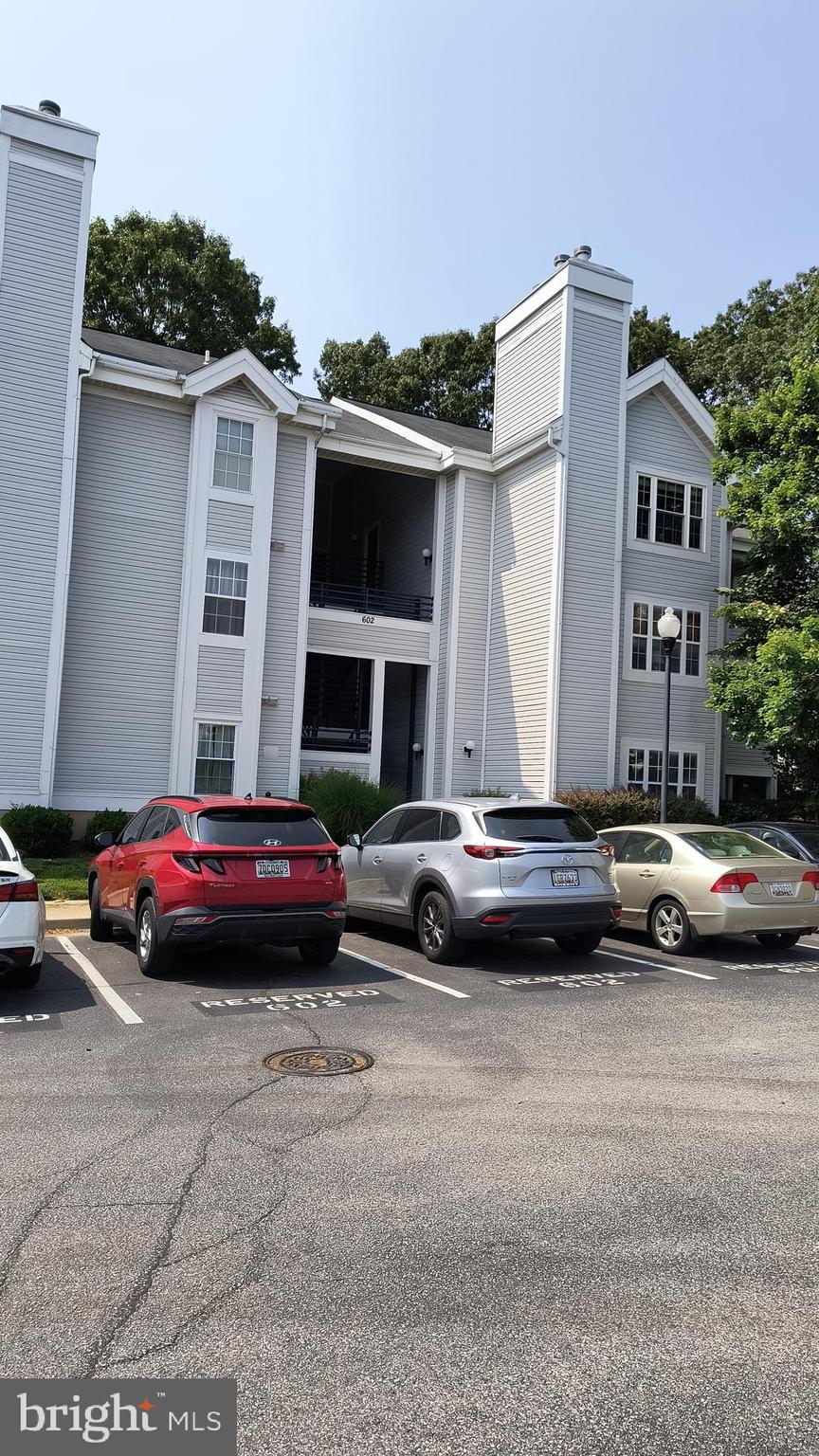 BEAUTIFUL MID LEVEL 2 BEDROOM/ 2 BATH CONDO LOCATED IN SOUGHT AFTER LYONS GATE COMMUNITY. UPDATE KITCHEN WITH GRANITE COUNTERS AND STAINLEES STEEL APPLIANCES. PASS THRU FROM KITCHEN TO DINING ROOM. LARGE LIVING ROOM WITH FIREPLACE & BUMP OUT POSSIBLE SUNROOM/OFFICE . NEW LUXURY VINYL PLANK FLOORING . COMMUNITY DOG PARK AND PLAYGROUND, HOME WARRANTY INCLUDED MUST SEE THIS ONE:: MOVE IN READY !