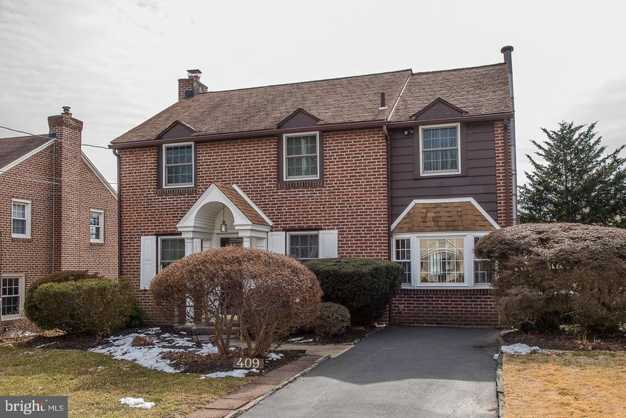 It is amazing today to have a home that has been in the same family for 70+ years. That is how well loved this home is and pride of ownership is reflected in this well maintained classic colonial in the desirable and convenient neighborhood of Evergreen Estates, Haverford S.D. The beautiful well maintained landscaping is the first thing you notice as you approach the home. Enter through the attractive front door into the nice bright formal Living Room that features hardwood floors and custom built-in shelving. This room receives plenty of natural light. The formal Dining Room features hardwoods and a chair rail. An Atrium door allows access to the large 3 Season Room overlooking the rear yard. The 3 Season room has a ceiling fan and a doorway leading to the newer lovely paver patio.  The eat-in kitchen features an electric range, dishwasher, pantry closet, oak cabinetry. Enjoy meals in the eating nook featuring custom made booth seating. Adjoining the kitchen is the family room that boasts a warm and cozy wood burning stove. An attractive bow window in the front lets in plenty of daylight. The surround system in this room adds to the appeal for fun and gatherings. The upper level features a generous sized Master Bedroom suite with double closets, desk writing area, ensuite tile bath with stall shower. 3 additional Bedrooms all with hardwood floors and ceiling fans complete the 2nd floor. There is a full Hall bath with newer tile, tub/shower with new tub surround. Need more space for gatherings, hobbies, whatever you want? The lower level is where to head to. It is partially finished in a light neutral color with wall to wall carpeting. There is an unfinished area for storage, utilities, laundry area and   bath for convenience. With the generous sized 3 season room, new paver patio, a free standing masonry BBQ grill and fenced yard makes for great warm weather fun and activites. This home features a newer roof, fresh paint, replacement windows, new pointing. Do not miss this home!  It is time for new owners to call this wonderful home theirs!