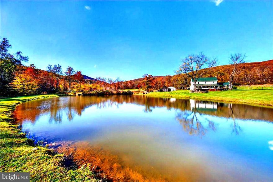 Historic Stone Farmhouse on 116.8 Acres of Rolling Virginia Countryside is available for the first time in nearly a century!

Tucked quietly into the foothills of Huntly, Virginia, where creeks weave through open meadows and mist settles gently over the Blue Ridge, stands a home that feels timeless. Built in 1720, the stone farmhouse at 290 Riley Hollow Road has watched centuries pass, yet it still radiates the same strength, warmth, and grace that have anchored it for generations.

The current owners have lovingly and meticulously renewed and restored this home and the accoutrements of the land, honoring its heritage while crafting it for todays modern lifestyle. The main level has been reimagined — all new flooring stretches through the living spaces, a beautiful enclosed sunroom and large deck have been added to the rear of the property enveloping the endless views. In the kitchen, quartz countertops gleam beside bar counter seating and a custom moveable island, designed from an original 1800s farm table and topped with black walnut milled from a fallen tree on the property — a piece of history reborn and returned home.

Throughout the farmhouse, hand-hewn beams, exposed stone walls, and original woodwork tell stories of another time, while updates throughout bring ease and comfort. Every corner balances authenticity and refinement — a place that feels both rooted and renewed.

Beyond the home, 116.8 acres unfold in every direction — a landscape of beauty and quiet power. Multiple creeks including Bearwallow creek, Sprucepine Branch and waterfall branch thread through the property, feeding a freshwater pond where deer and heron often stop at dusk. The properties stone walls were labor intensively rebuilt and trace the hillsides, marking the passage of time with enduring grace. At the edge of the horizon rises Little Bastard Mountain, a rugged and beloved landmark that seems to guard the valley below.

Practicality meets grandeur here: a massive steel Quonset Building stands ready for whatever your pleasure… equipment, hobbies, small plane hangar, indoor pickleball court or any creative venture one might have; an oversized garage with ample space for 4 vehicles, a storage shed with log shed, a cattle run-in, a former horse stable, and the remains of a spring house provide ample space for work, enjoyment and life on the land. Every element serves a purpose, blending function with beauty in the rhythm of rural Virginia living.

This is more than a property — it’s a living legacy. A place where history breathes through every beam and stone, where craftsmanship and care have shaped both the home and the land. Whether you dream of a working farm, a peaceful retreat, or a multigenerational sanctuary, 290 Riley Hollow Road offers a rare and extraordinary chance to own a true piece of Virginia’s soul.

Come walk the fields, listen to the creeks, embrace the views and feel the past and present meet in perfect harmony. 290 Riley Hollow Road is more than a home — it’s a legacy estate, a story of Virginia’s past and future, waiting for its next steward.

Schedule your private showing to explore this extraordinary property where history, craftsmanship, and nature converge.

Want a larger home? There is plenty of space for an additional dwelling or use the plans already created for this property. Architectural drawings/planset for an enlarged main home are available to the buyer of this amazing property.

Be sure to watch the amazing aerial video!