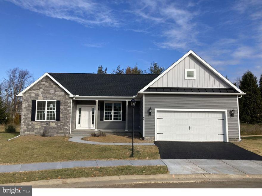 Our Northwood Model is Now Available for Immediate Delivery! This Floorplan includes a 1st Floor Primary Bedroom –  2 Car Garage  – Stone Front – Upgraded Siding Style & Color – Unfinished Basement – 2 Piece Basement Bath Rough-in – Optional Laundry Layout – Kitchen Island – 36’’ Kitchen Cabinetry – Granite Countertops – Stainless Steel Appliances – Upgraded Ceramic Tile in Primary Bath - Laminate Flooring in Foyer, Dining Room, Family Room, Kitchen/Pantry – Upgraded Carpeting & Padding in All Bedrooms – Gas Heat. Please check with our sales manager for details & to receive access to Northwood model. Builder's Model Home located on site at 158 Fairplay Road, Gettysburg, PA. Must use builders preferred lender & title company to receive  builder incentive. Please contact us today for more details! Open Daily 11am to 6pm! Please Note - The completed photos shown are of another like Northwood Model. Photos may show additional options.