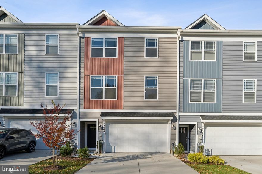 Welcome Home! The community is located directly across the street from Severn Danza Park, one of Anne Arundel County's premier parks, and within a short distance to a variety of restaurants and shops. Three bedrooms, three and half bath homes offer a finished lower level with a spacious closet and full bath which could be an entertainment area, large office, or a Fourth bedroom. Enjoy a large Primary bedroom with an en suite master bath, an open concept main level, and over 2,000 square feet of living space spanning three floors.  Some additional features of the home: First Floor Garage Entry with Closet, Stainless Steel Appliances complete with a 5 Burner Gas Range, Painted Kitchen Cabinetry, Granite Kitchen Countertops, Natural Gas Heat, Luxury Vinyl Plank Flooring throughout, electric charging station prewire in garage, and window blinds.